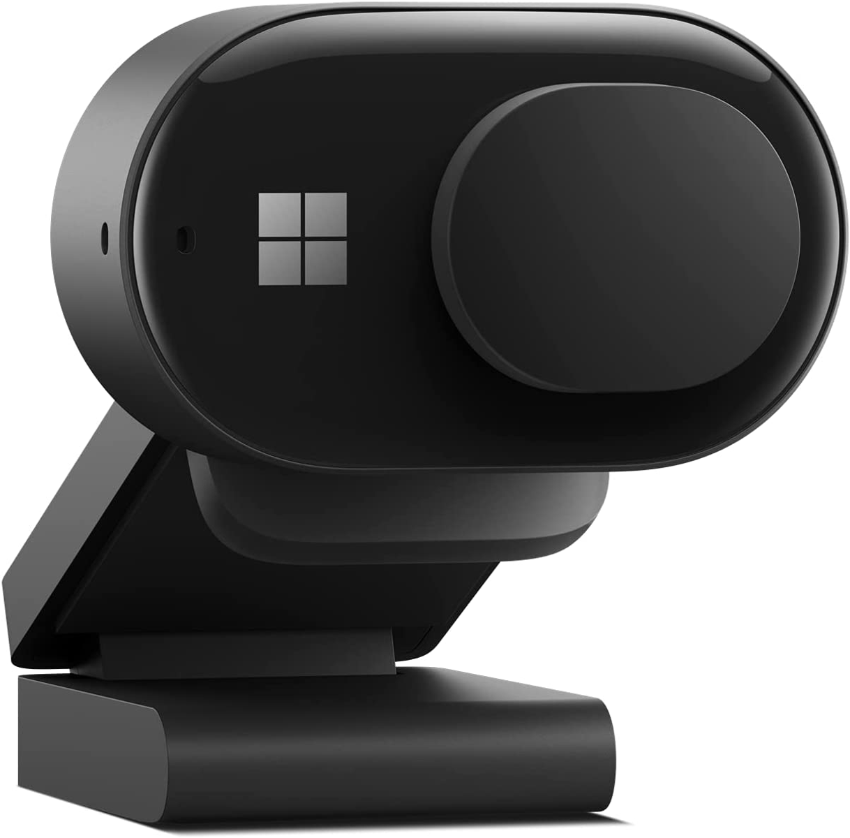 Cámara web negra con logo de Microsoft. Fondo blanco.