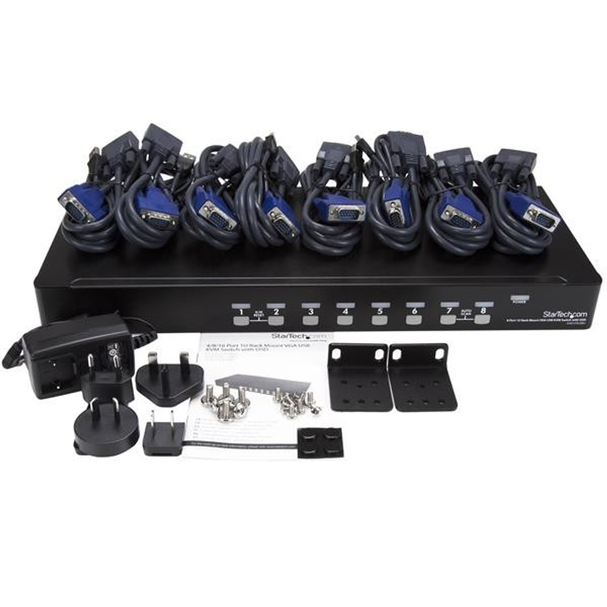 Caja negra con cables y conectores. Incluye varios cables VGA y otros componentes.