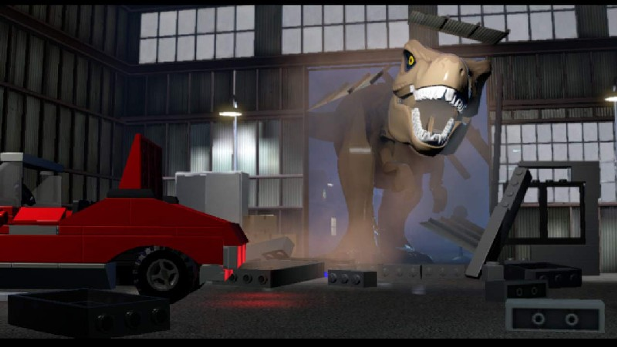 Scena z gry Lego z atakującym T-Rexem. Czerwony samochód i gruz na pierwszym planie.