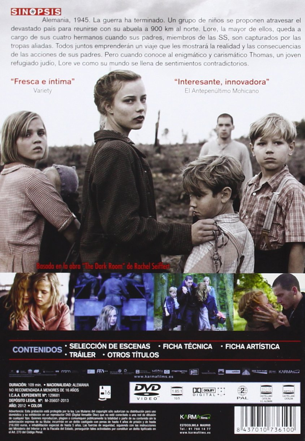 Parte trasera de una caja de DVD. Varios niños y adultos de pie en un campo. Texto en español.