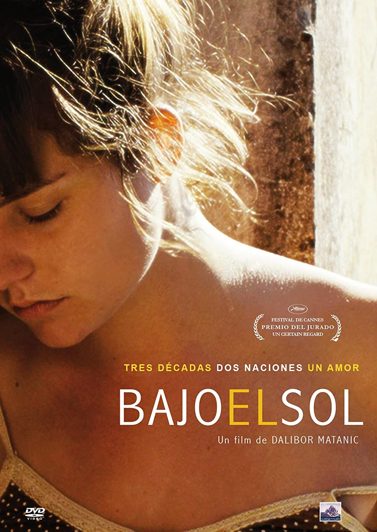 Portada de DVD con el rostro de una mujer, el título 'Bajo el Sol' en español y un crédito de película.