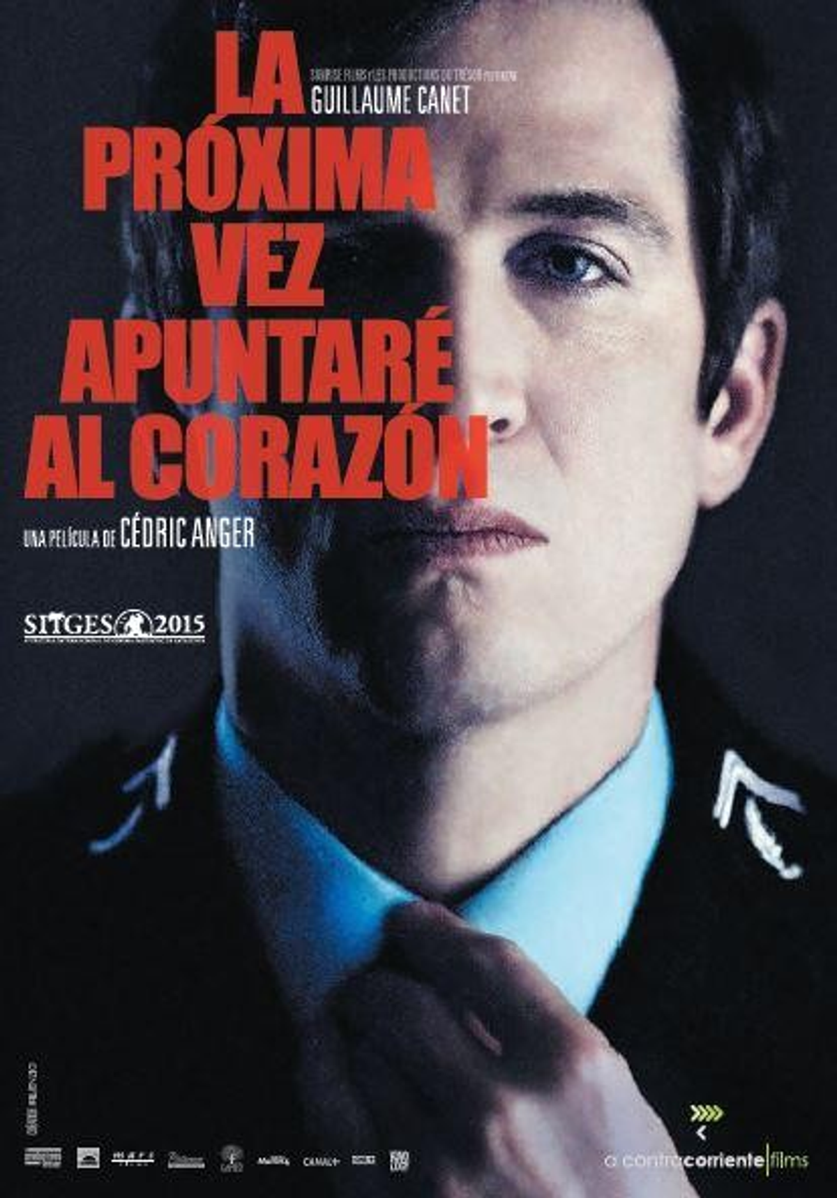 Portada de DVD. Un hombre con traje. Título: La Proxima Vez Apuntaré al Corazón. Texto en español.