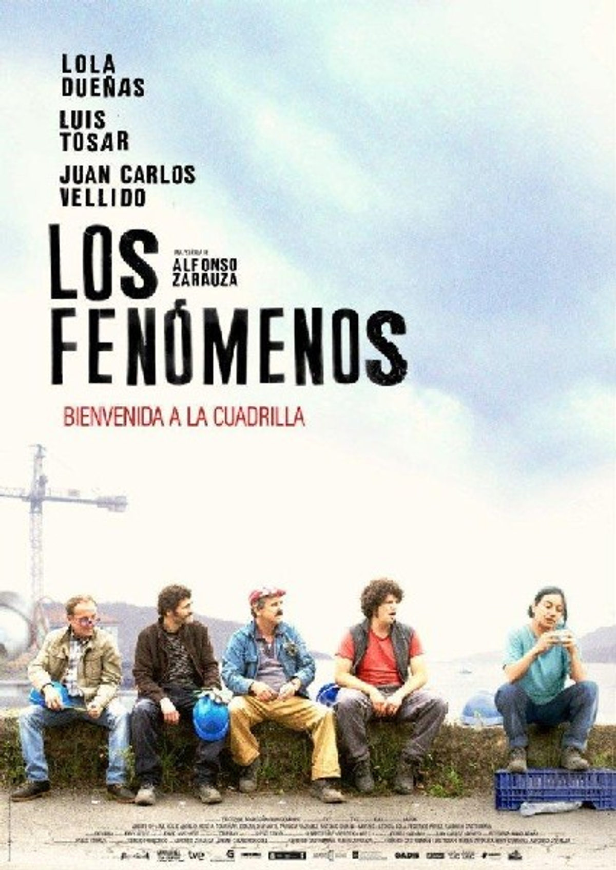 Póster de película: Grupo de trabajadores de la construcción sentados, título.
