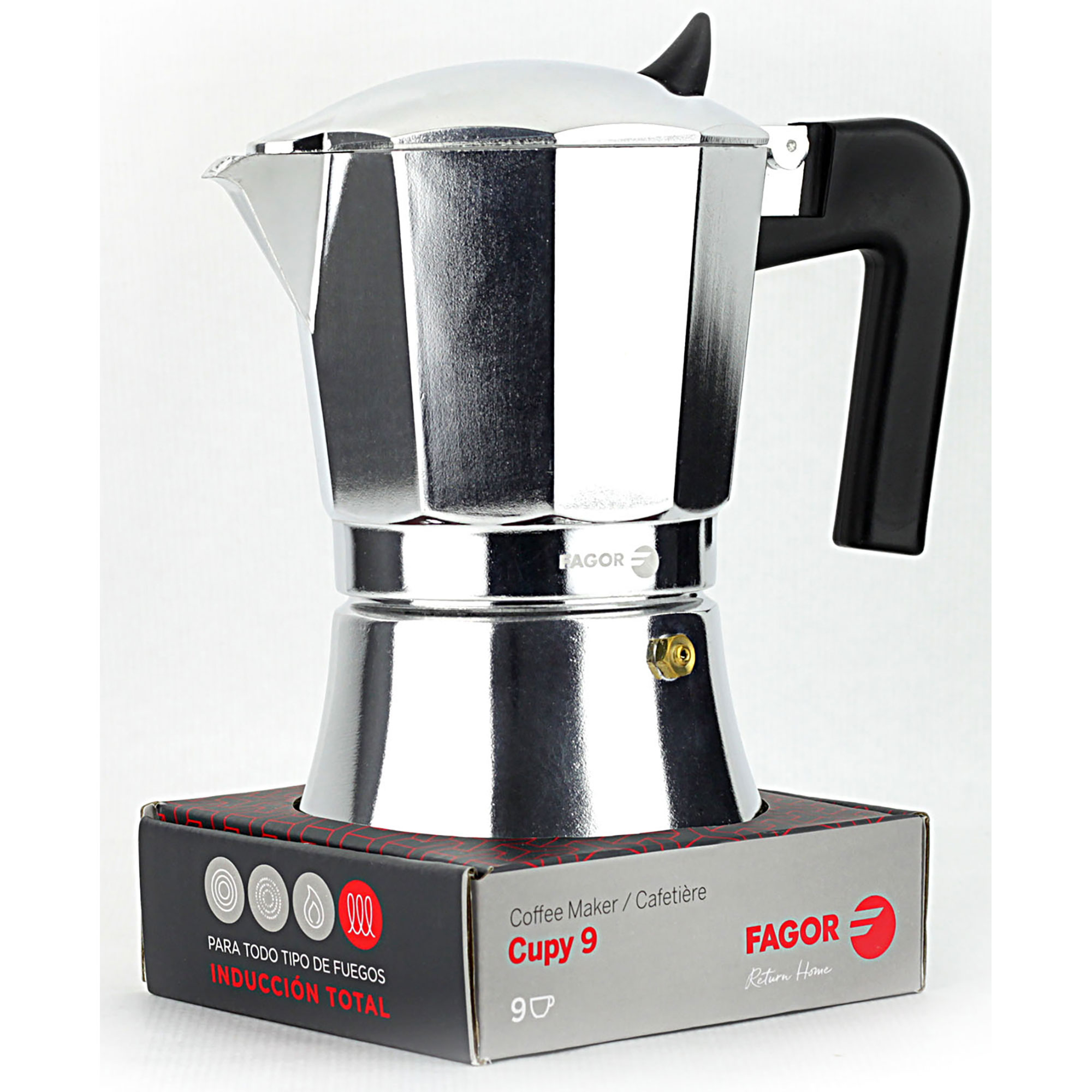 Cafetera plateada brillante con asa negra, en una caja con texto.
