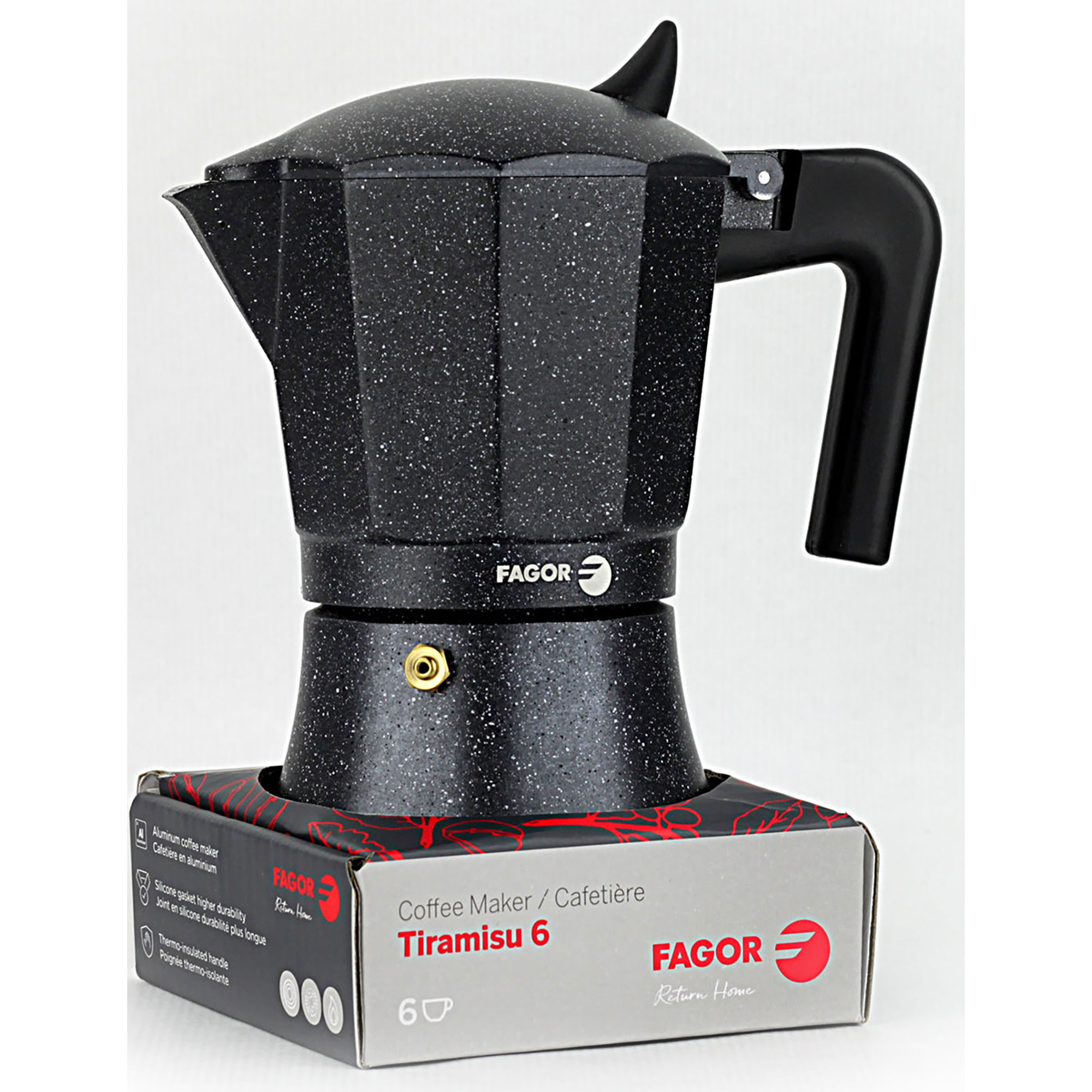 Cafetera espresso negra con diseño moteado, con la marca FAGOR en la caja.