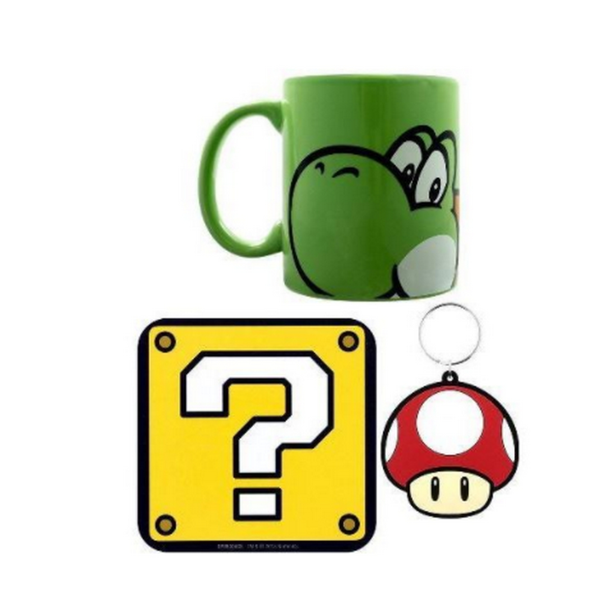 Zielony kubek Yoshi, blok ze znakiem zapytania i brelok z grzybem na białej powierzchni.