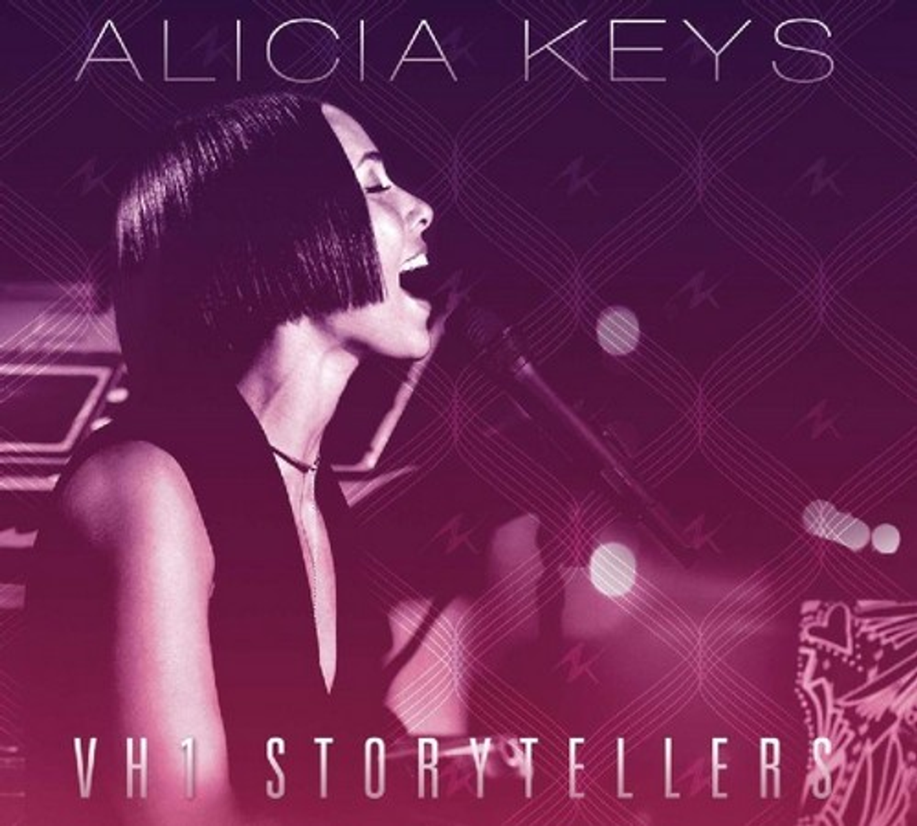 Alicia Keys singing into a microphone, with a purple background. The words "VH1 Storytellers" are at the bottom.
