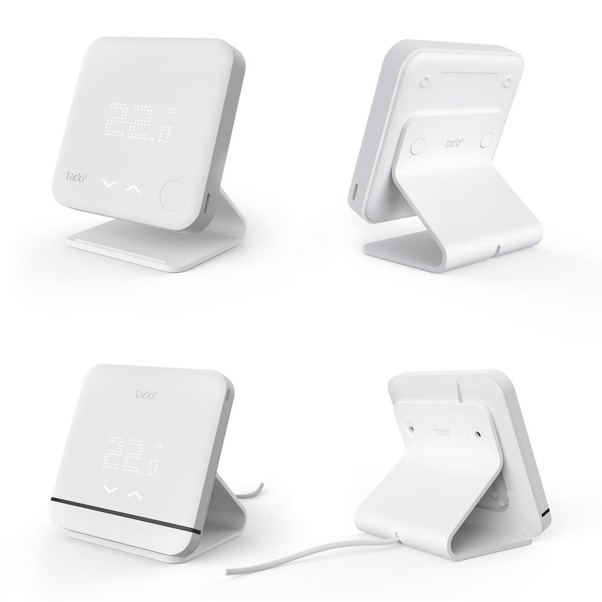 Four views of a white thermostat. White background.