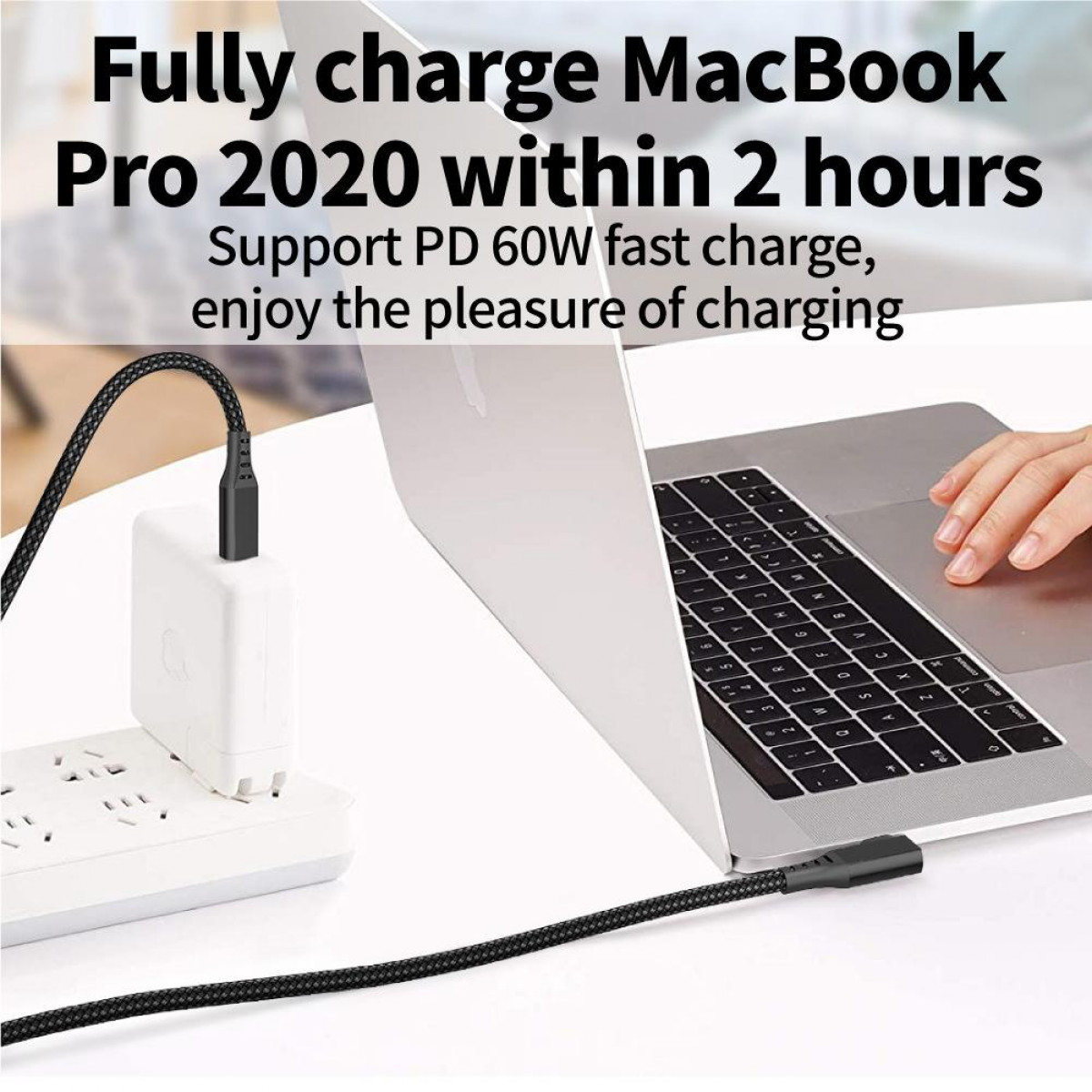 Laptop jest podłączony do kabla ładującego i gniazdka ściennego. Tekst mówi, że można go w pełni naładować w 2 godziny.