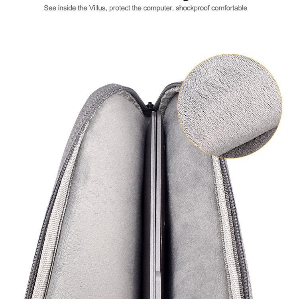 Otwarta osłona na laptopa, ukazująca miękką wyściółkę wewnętrzną. Osłona jest szara, z bliska wnętrza.