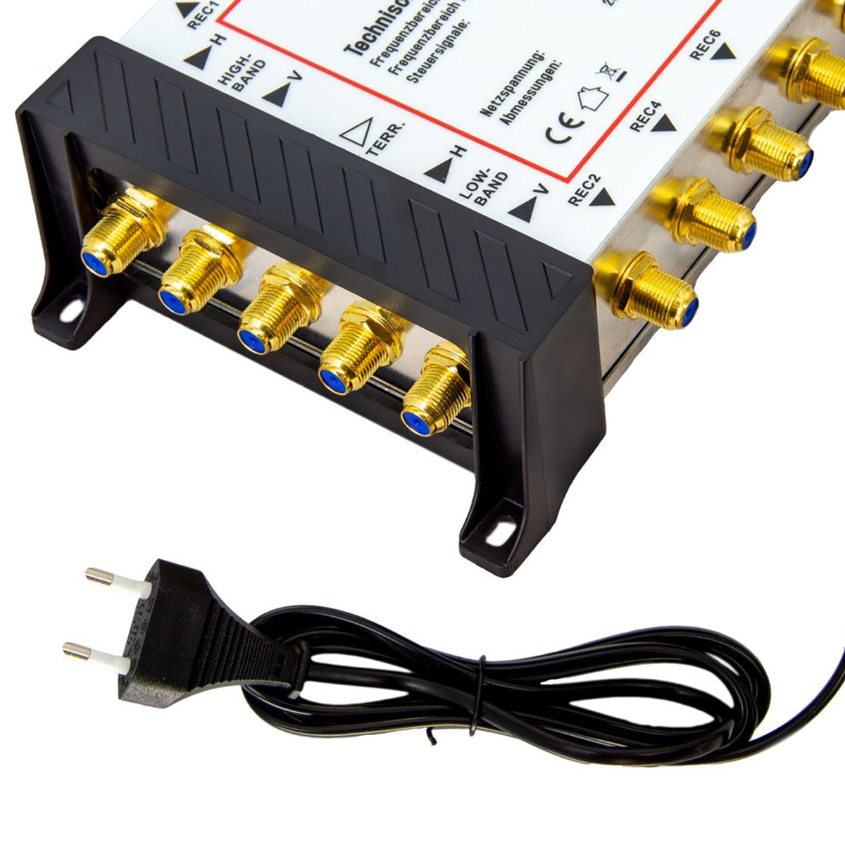 Elektronische Komponente mit mehreren goldfarbenen Steckern und einem schwarzen Netzstecker mit Kabel.