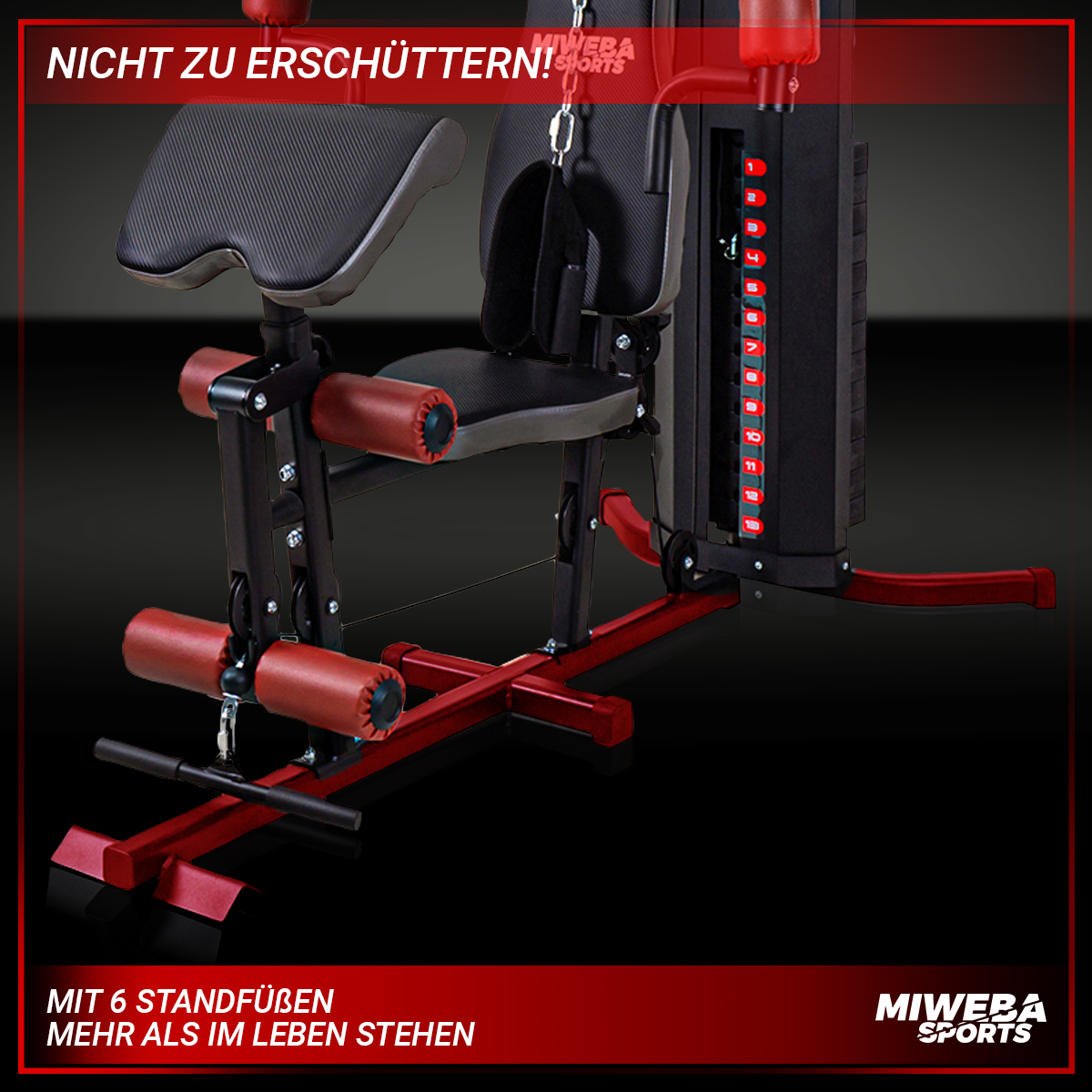 Eine rot-schwarze Trainingsmaschine mit Gewichtsblöcken und roten Akzenten.