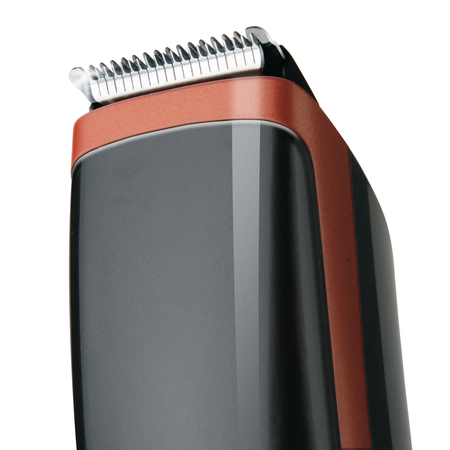 Primer plano de un cabezal de recortadora de barba negro y naranja. Las cuchillas son visibles.