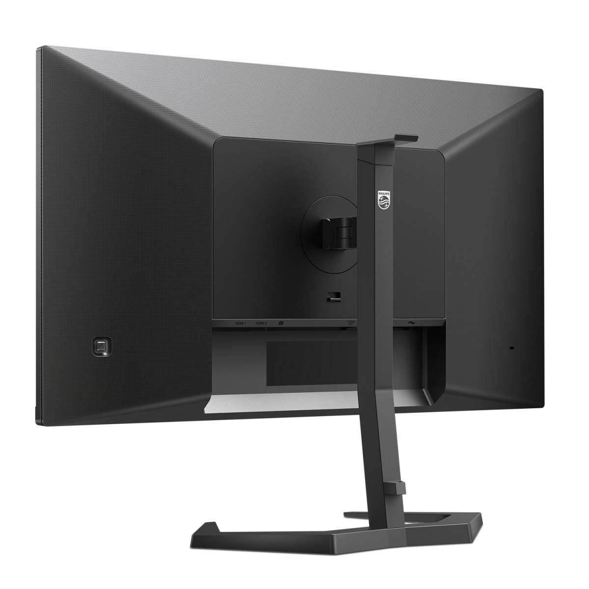 Rückansicht eines schwarzen Computermonitors mit Ständer. Anschlüsse sind unten sichtbar.