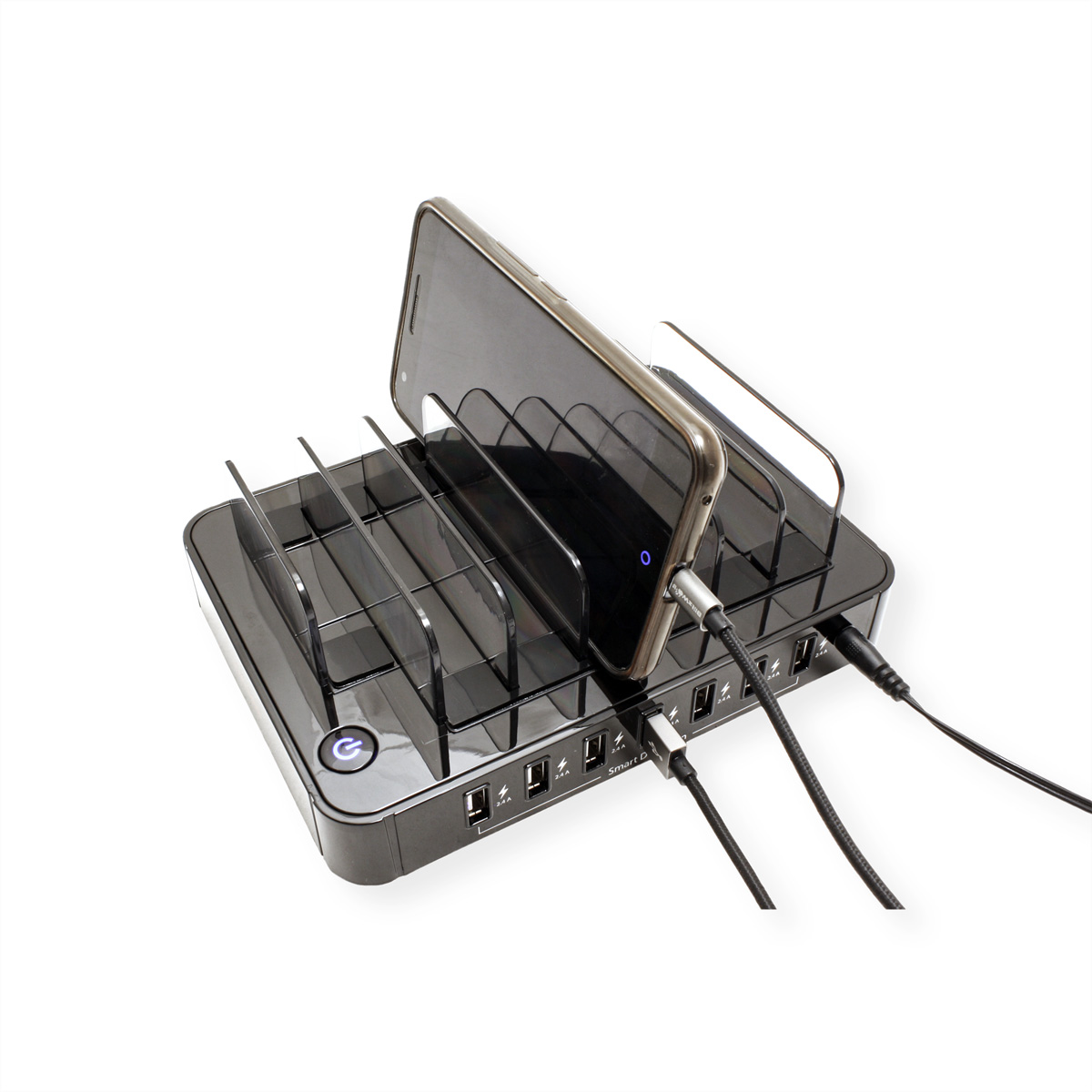 Black charging station with multiple slots for phones and USB ports. A phone is connected.
