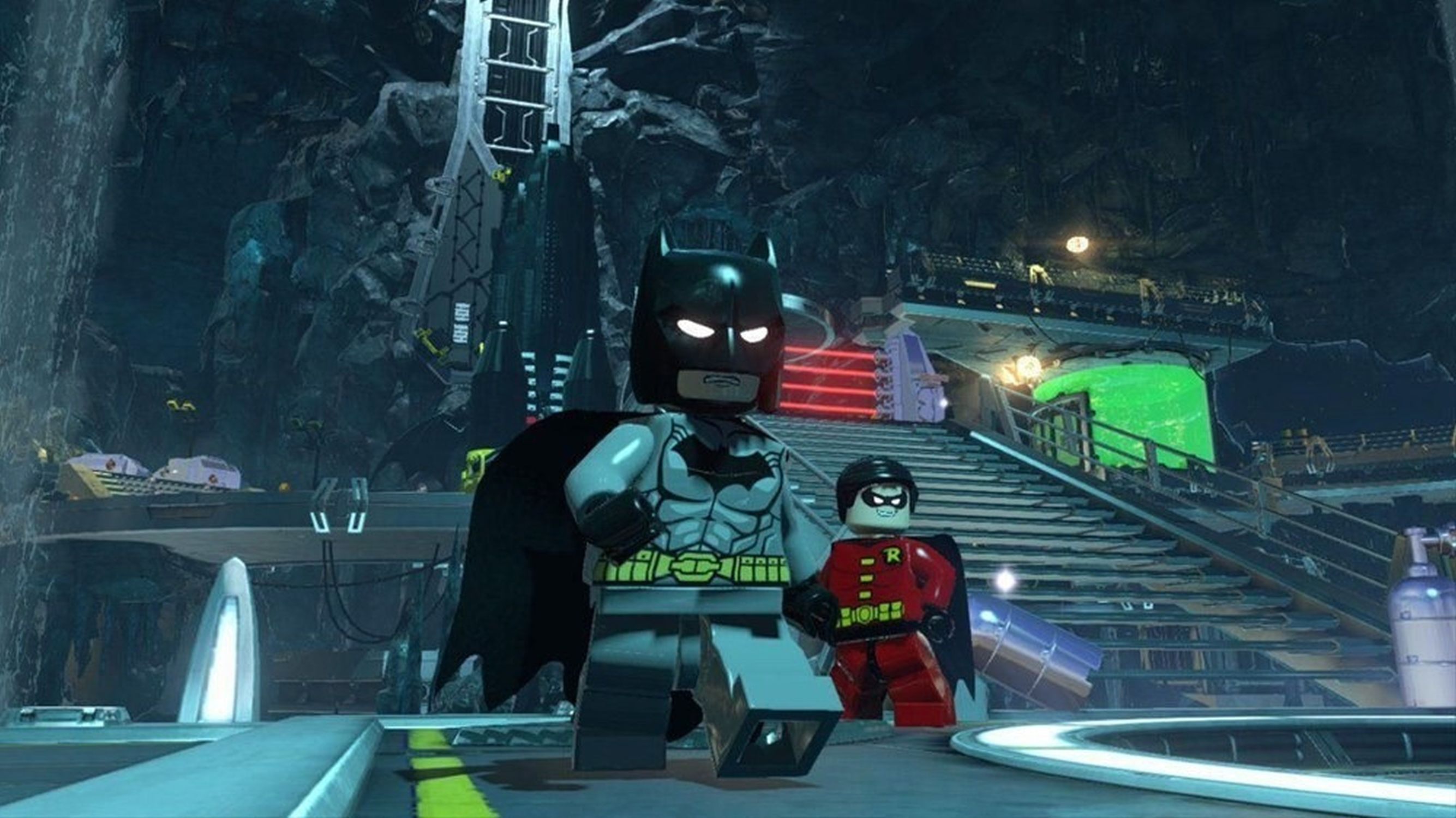 Lego Batman et Robin debout dans un décor Lego Batcave.