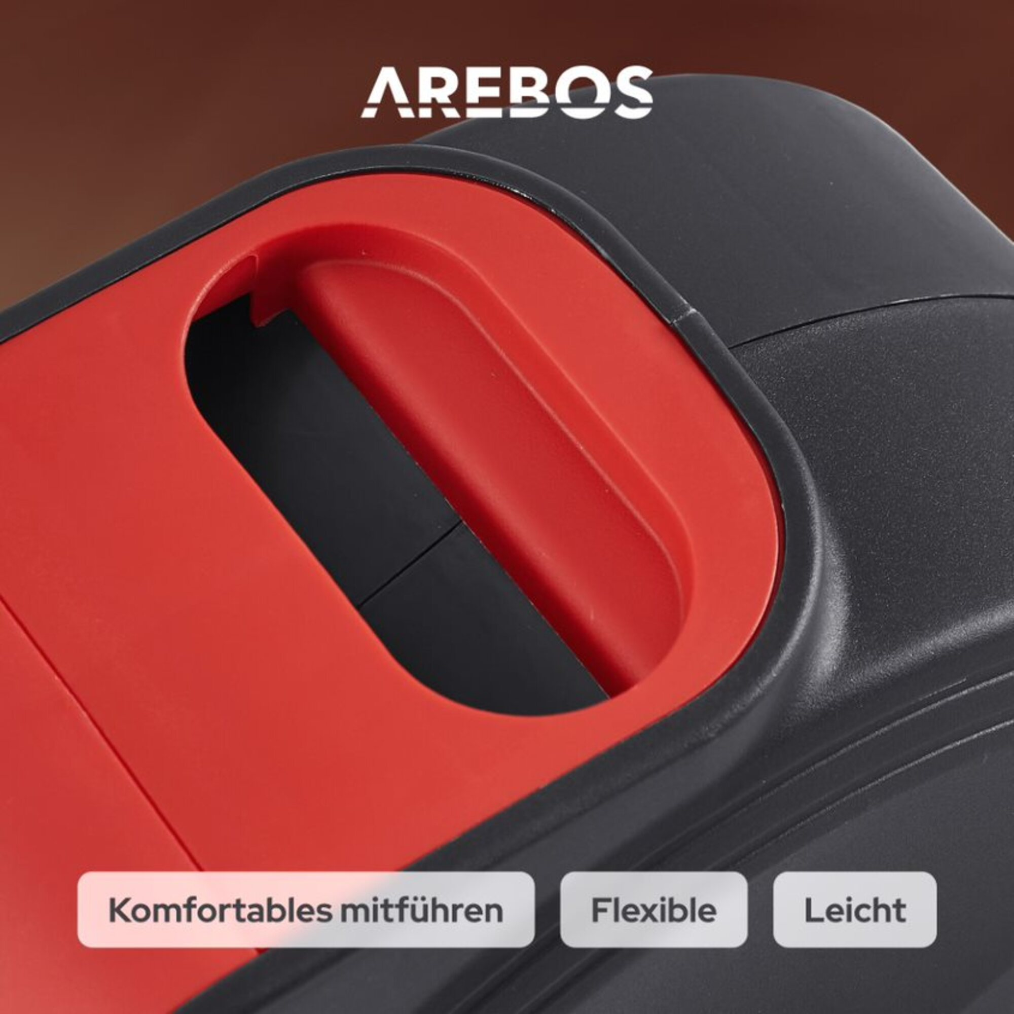 Nahaufnahme eines roten und schwarzen Griffs. Der Griff befindet sich an einem schwarzen Objekt mit dem AREBOS-Logo.