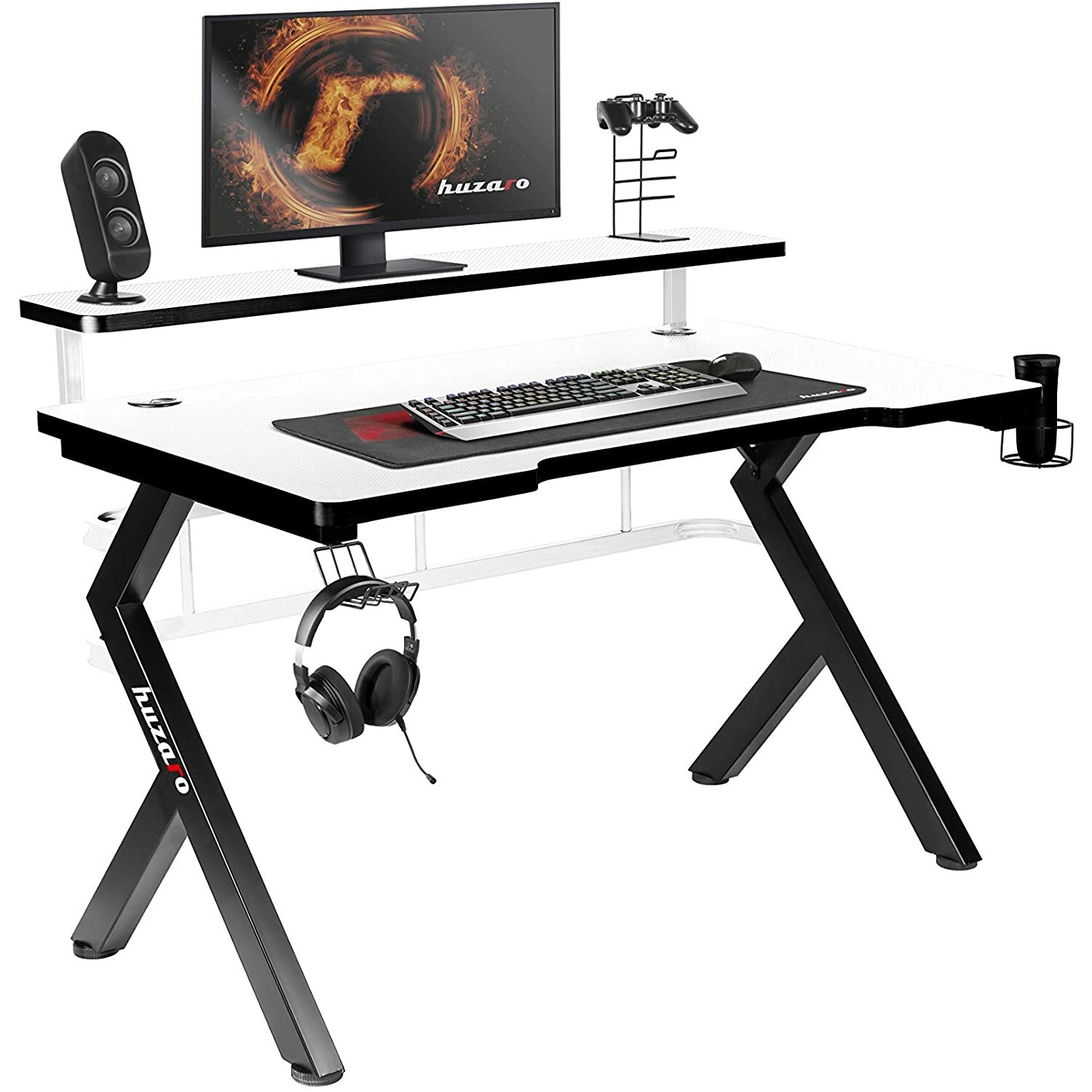 Biurko gaming z czarnymi nogami, białą powierzchnią, monitorem, głośnikiem, klawiaturą i słuchawkami.
