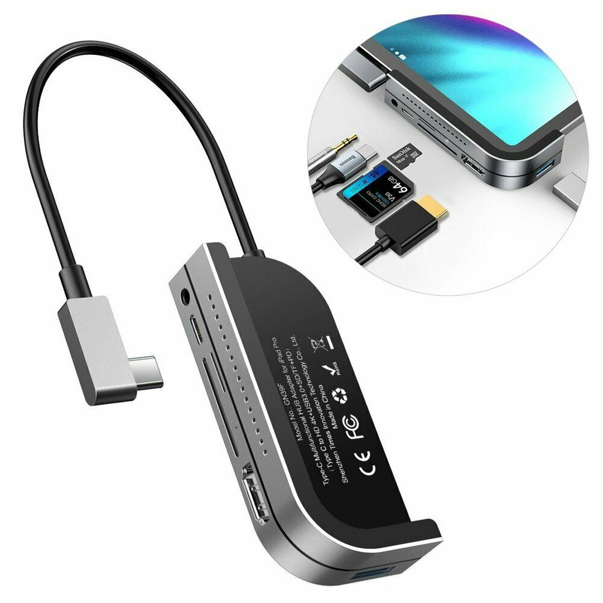Schwarzer und silberner USB-Hub mit mehreren Anschlüssen, verbunden mit einem Tablet und anderen Geräten.