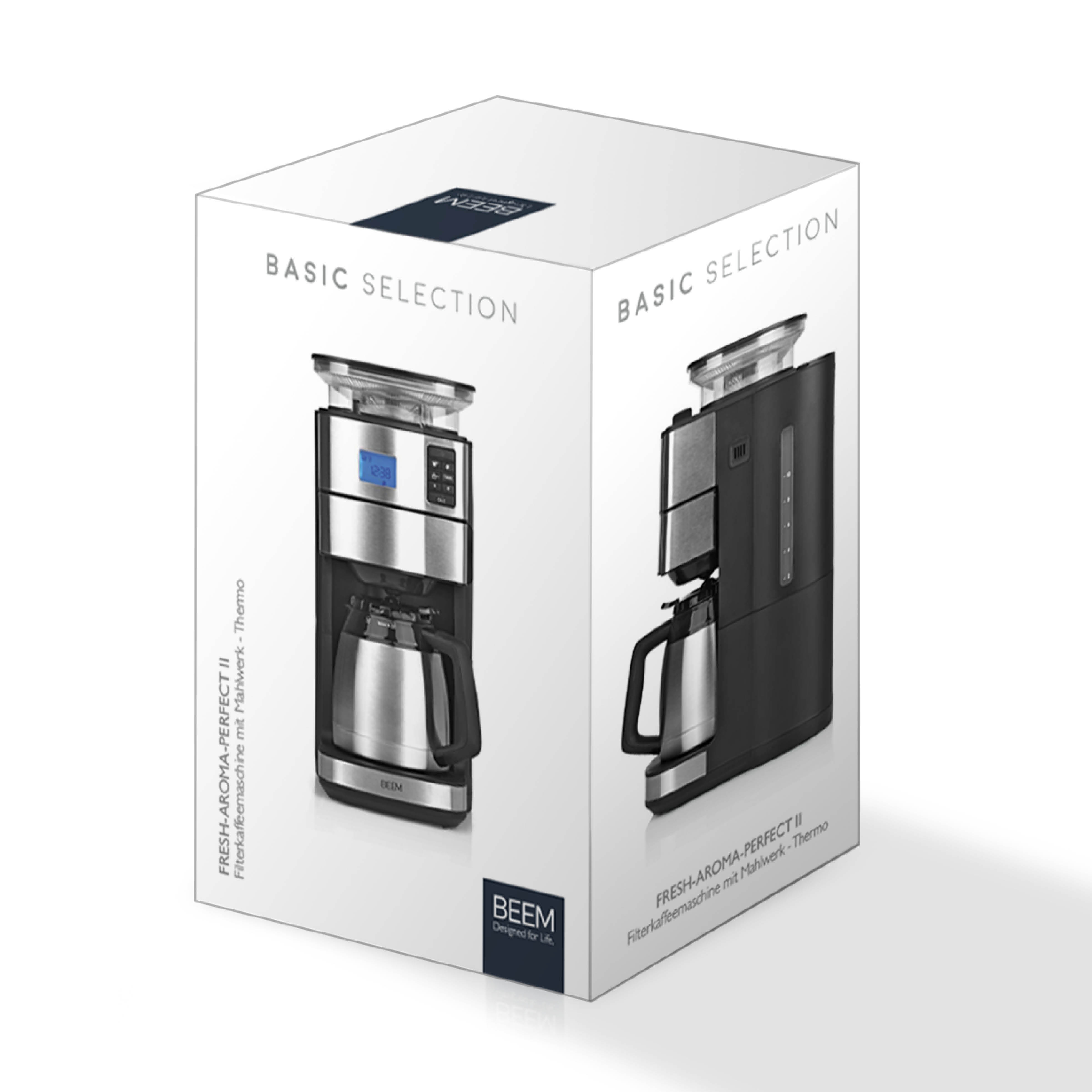Scatola della macchina da caffè con due immagini del prodotto. Dice 'BASIC SELECTION' e 'FRESH-AROMA-PERFECT II'.