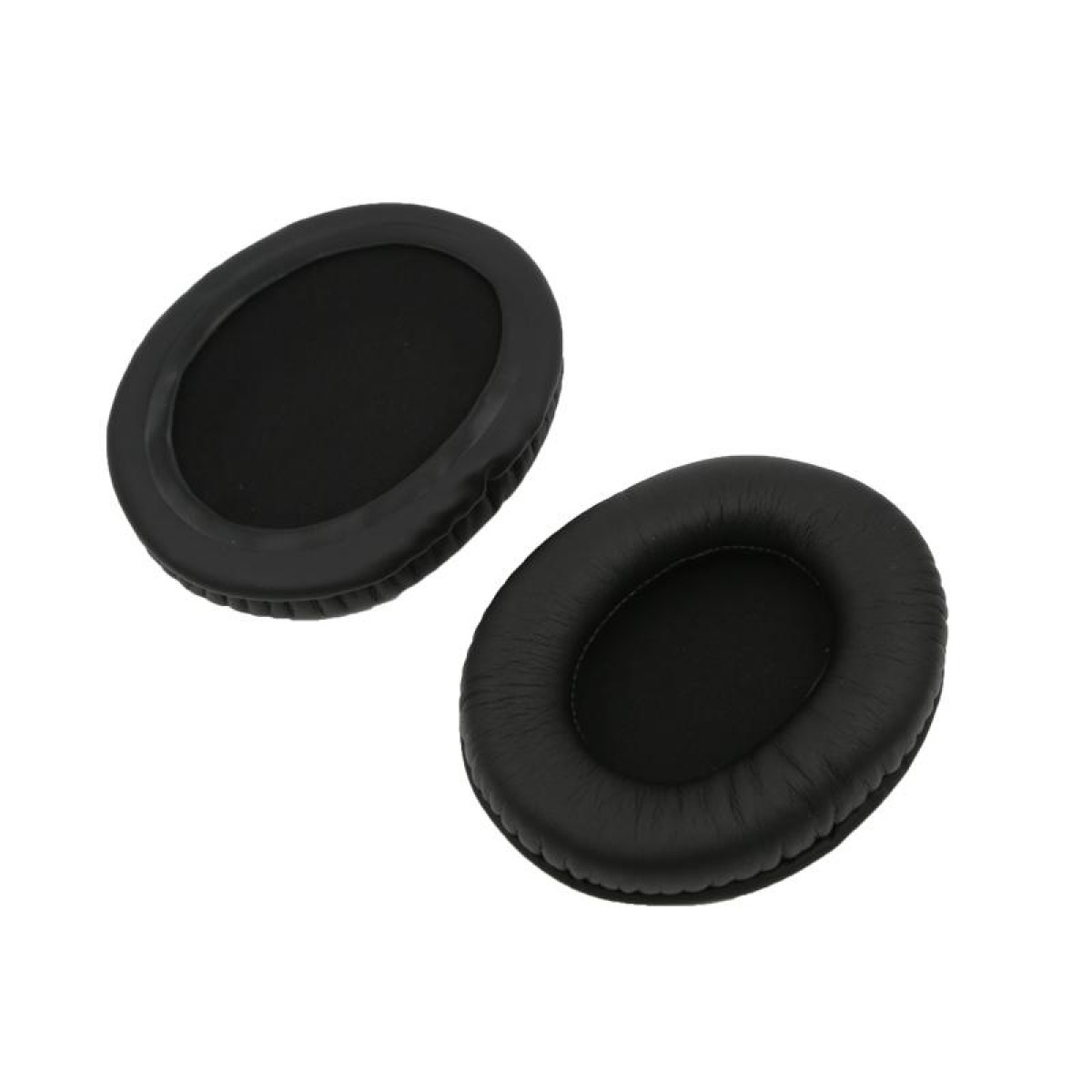 Dos almohadillas negras para auriculares. Una dentro de la otra, mostrando la forma.