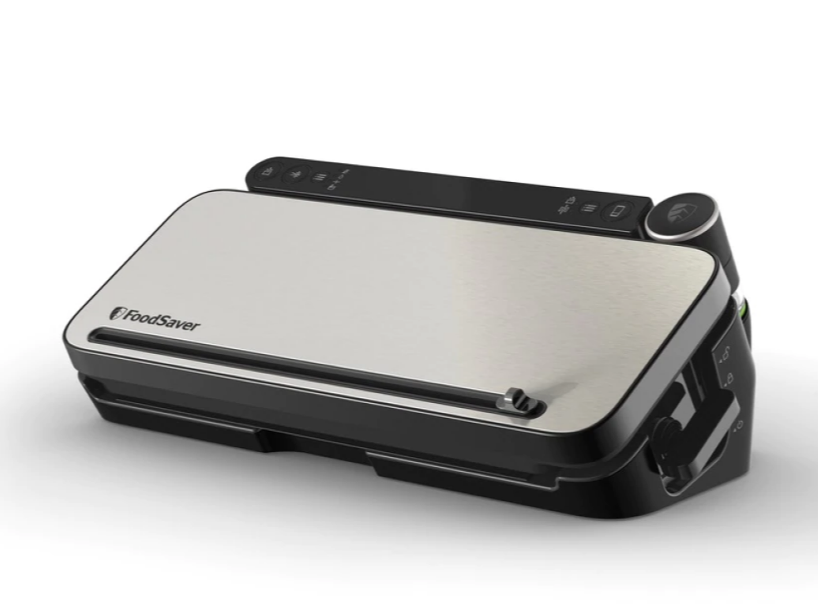 Zgrzewarka próżniowa FoodSaver. Srebrne i czarne urządzenie z przyciskami u góry. Białe tło.