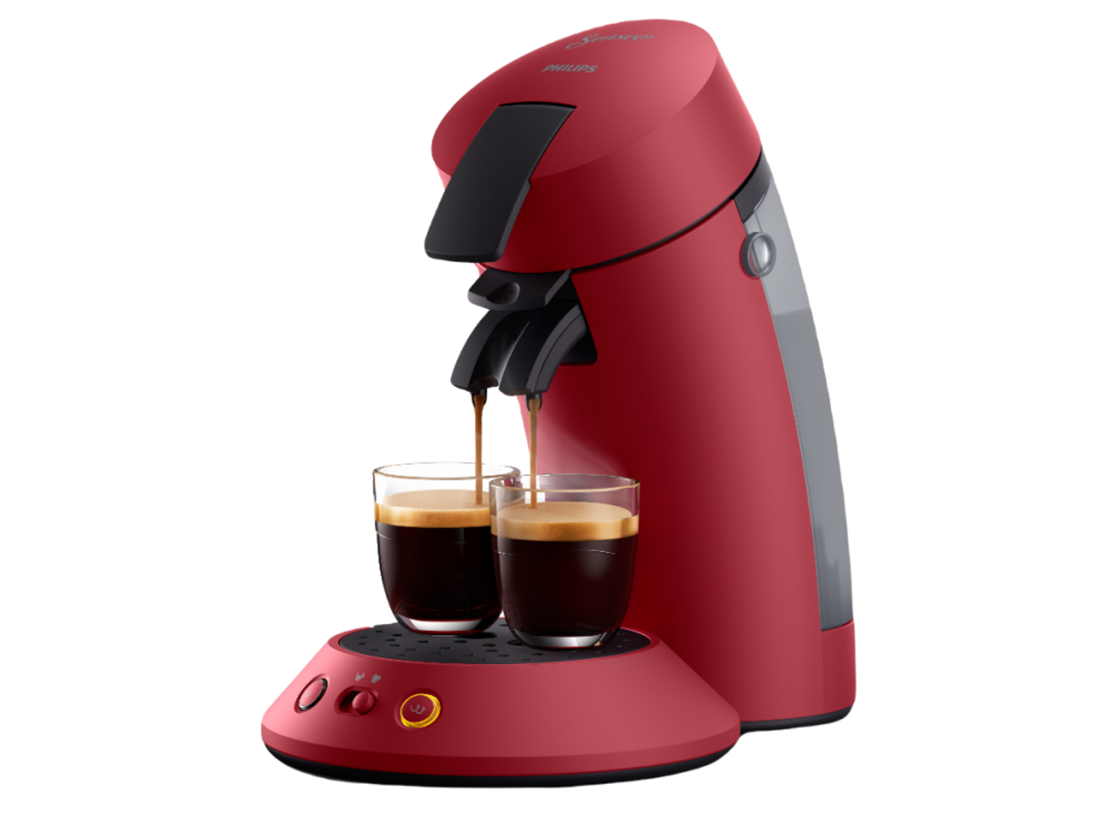 Una macchina da caffè Philips Senseo rossa con due bicchieri che si riempiono di caffè. La macchina è accesa.