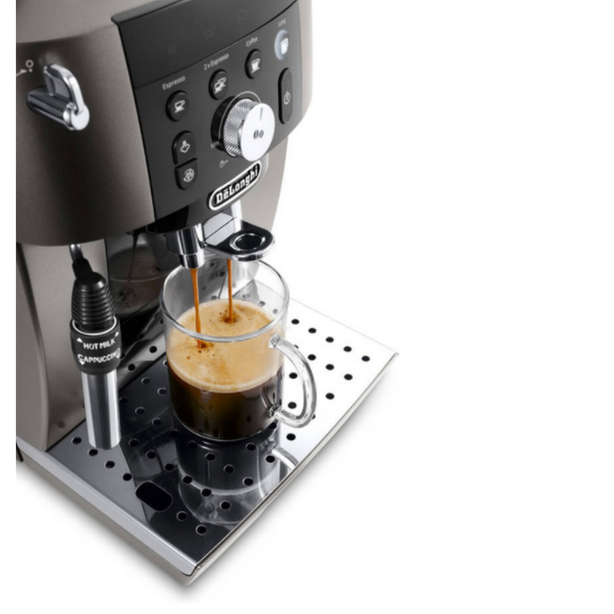 Máquina de espresso vertiendo café en una taza de vidrio. La máquina es gris y negra.