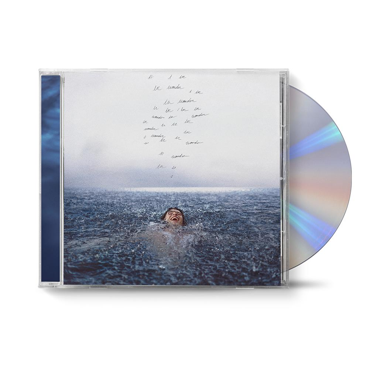 Copertina dell'album CD. Una persona è immersa nell'acqua, visibile solo la testa. La copertina ha del testo.