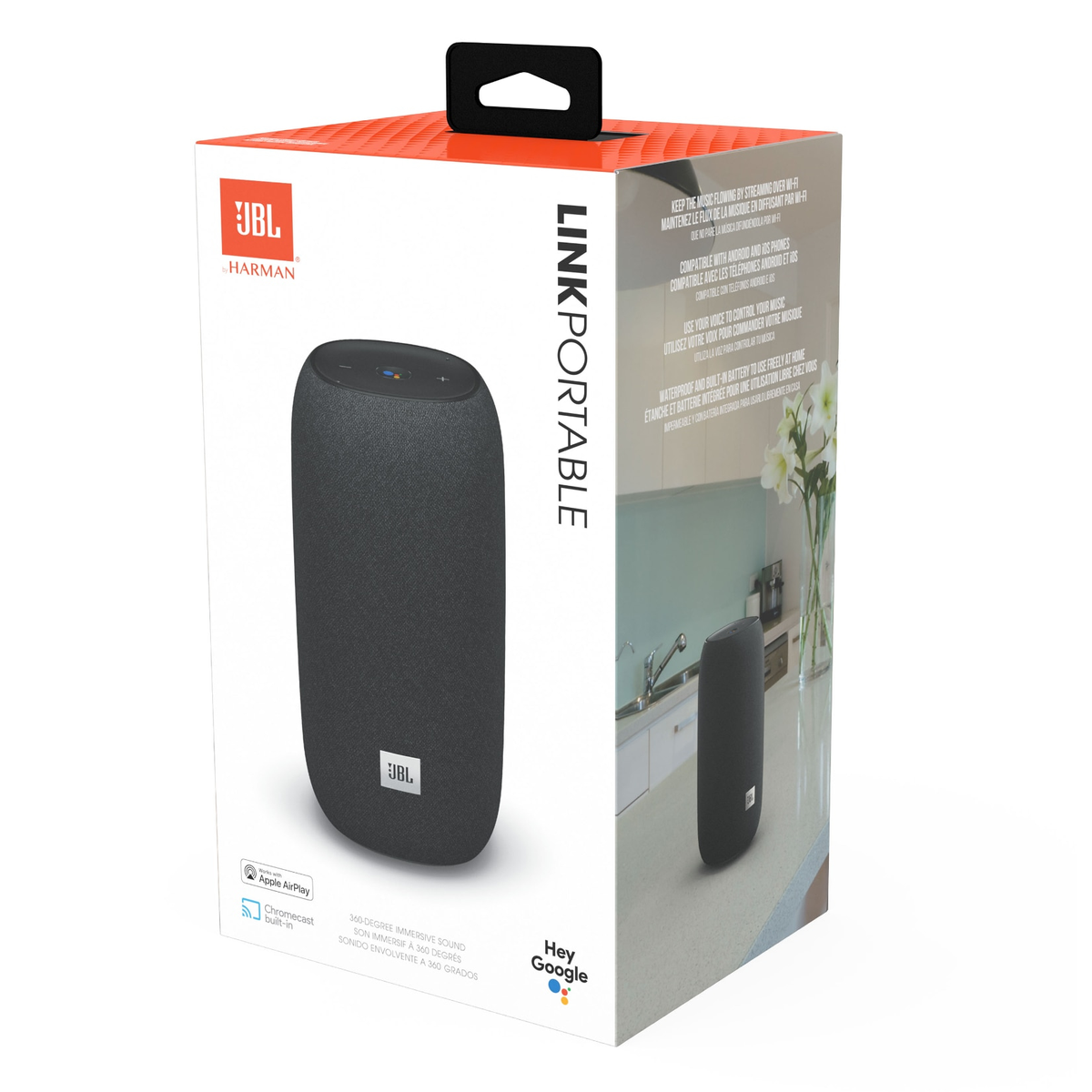 Un altoparlante JBL in una scatola con una scena di cucina sullo sfondo.