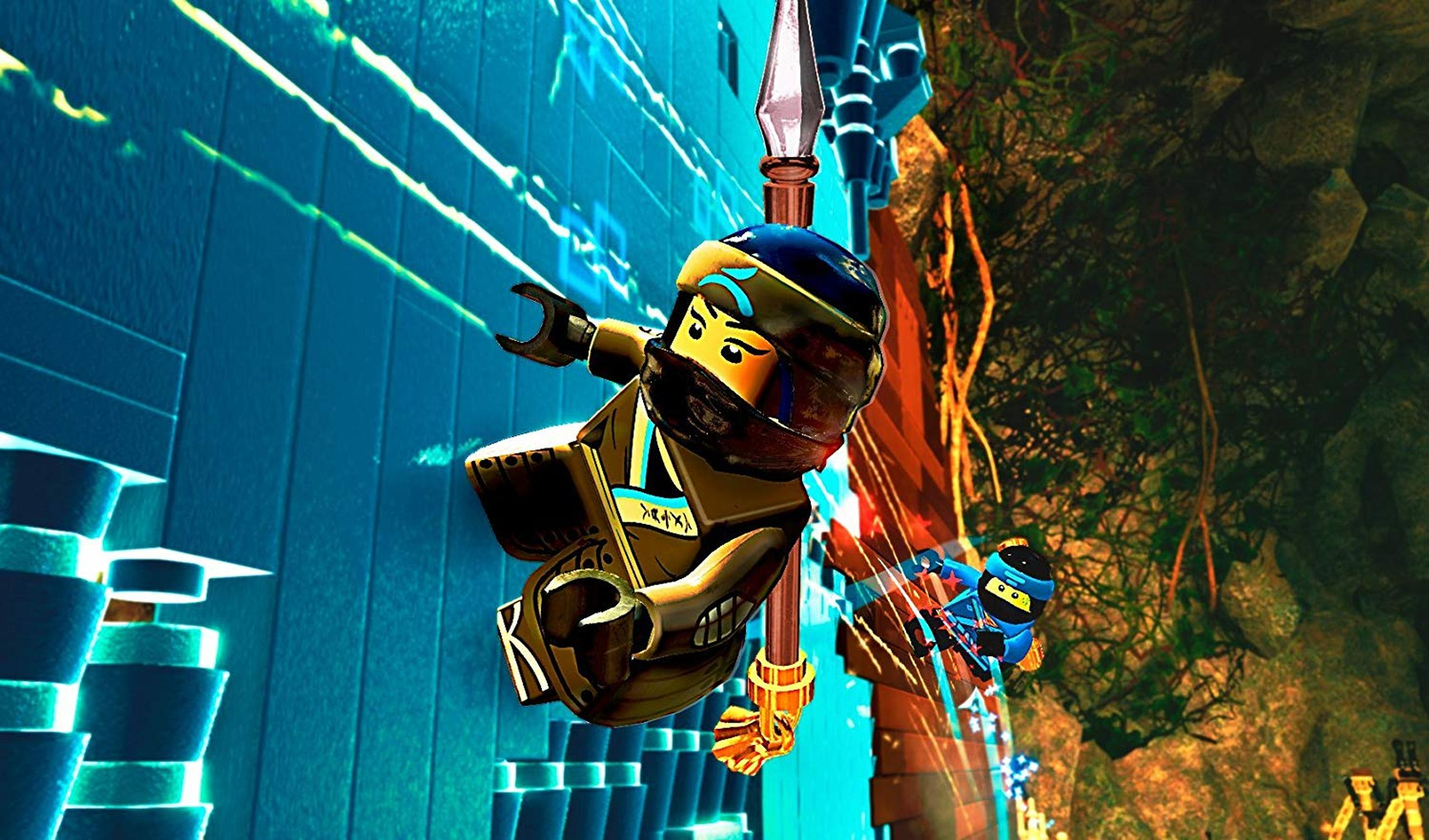 Una figura Lego ninja è appesa a una lancia. Un altro ninja è sullo sfondo, una parete blu a sinistra.