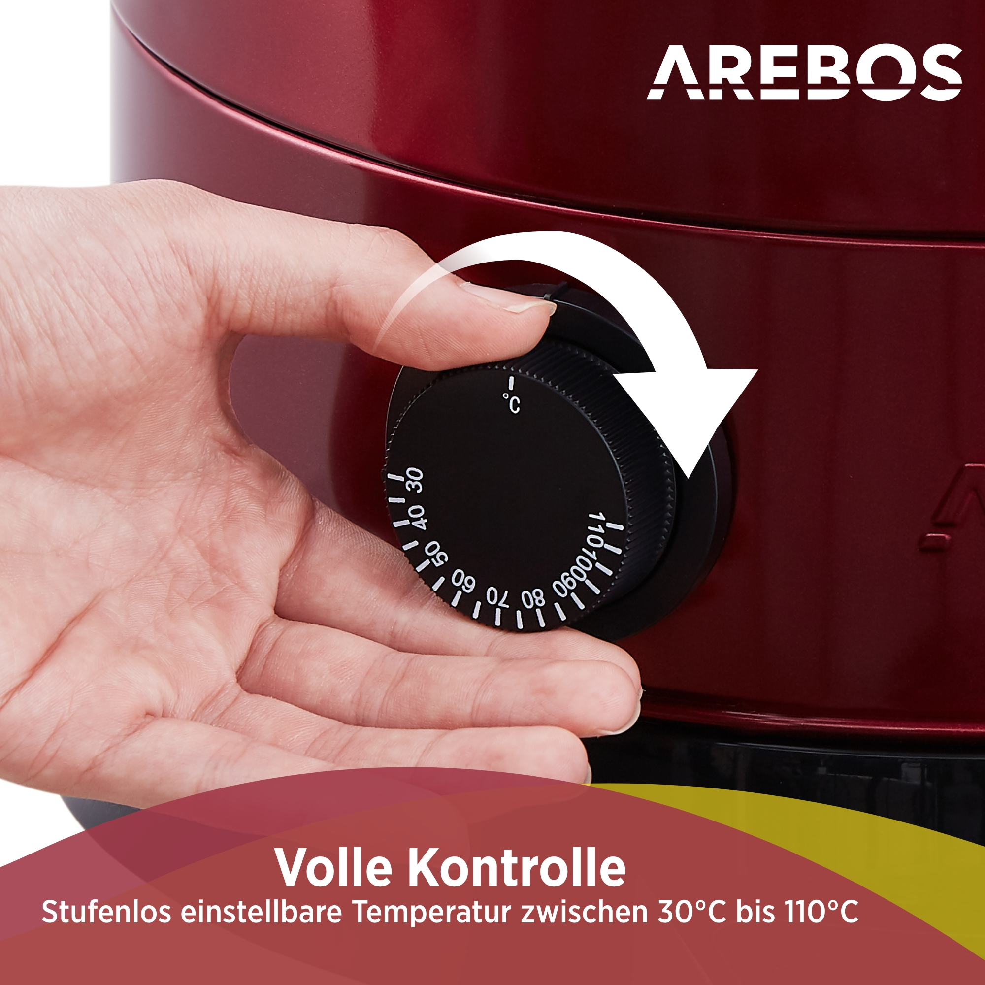 Eine Hand dreht einen schwarzen Knopf an einem roten Gerät, Text zur Temperaturregelung.