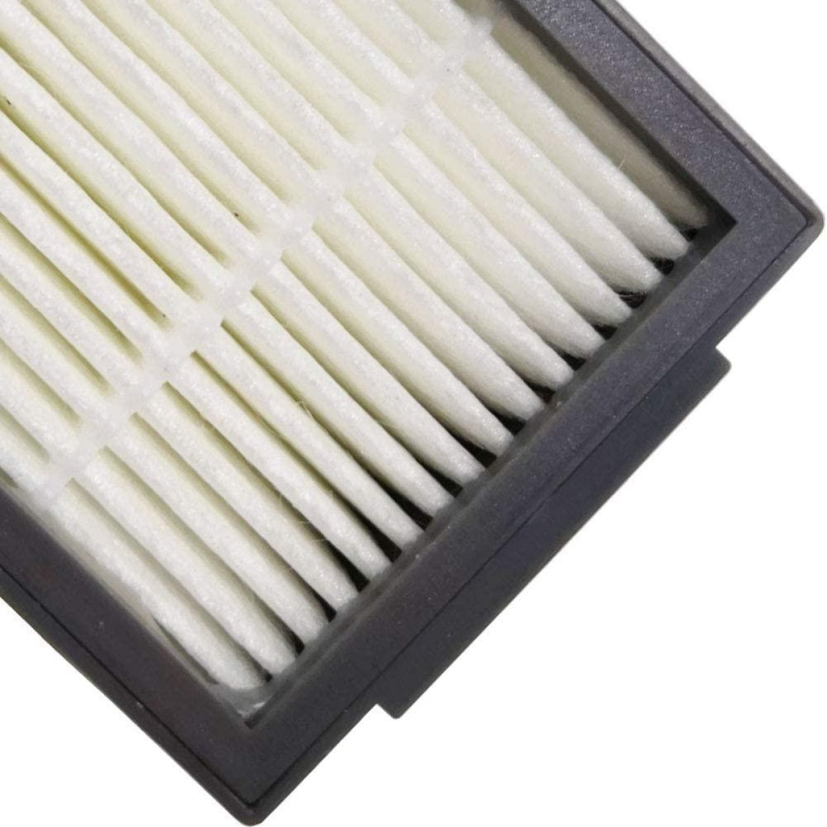 Zbliżenie filtra powietrza z białym elementem filtrującym.