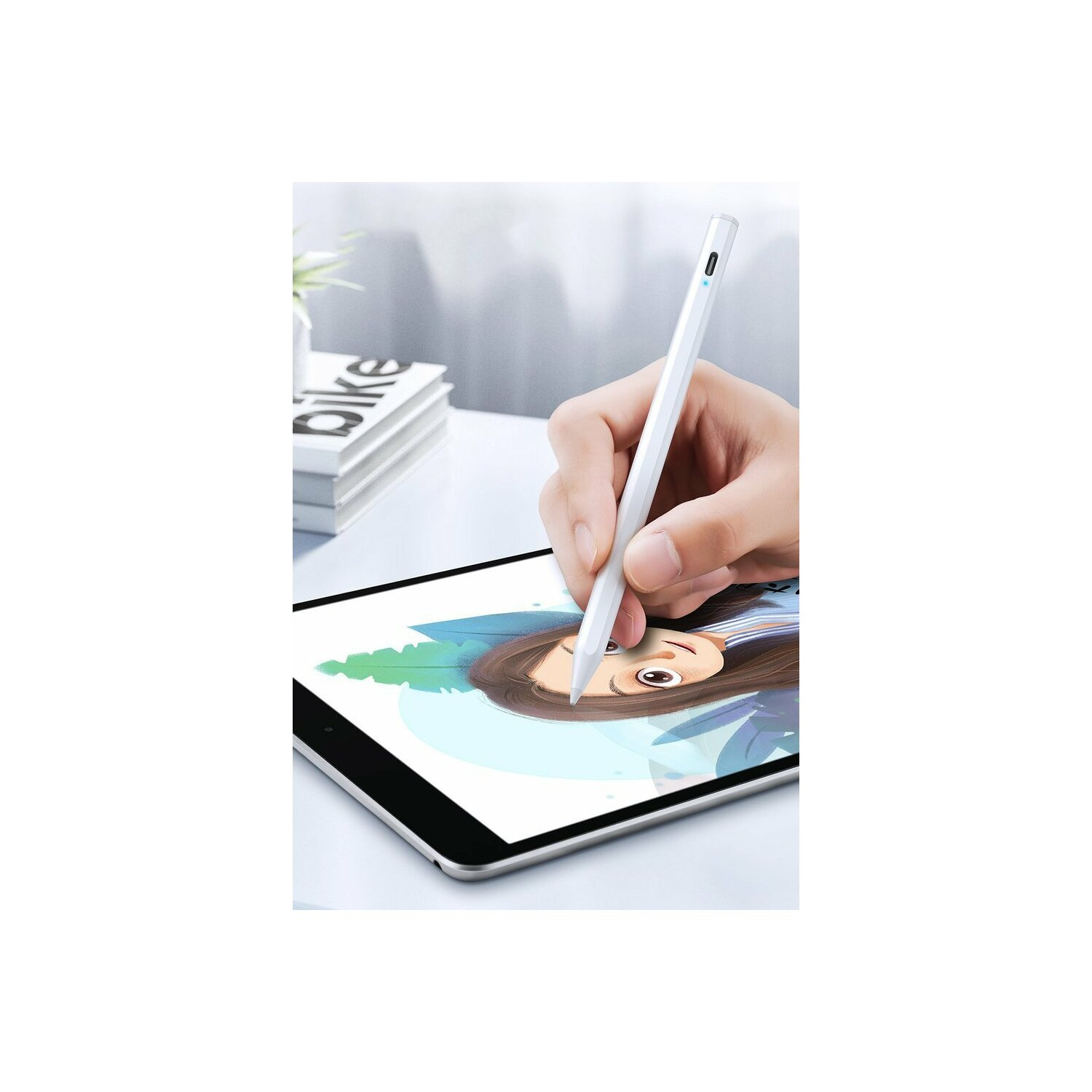 Hand, die einen weißen Stift auf einem Tablet mit einer Zeichnung benutzt.