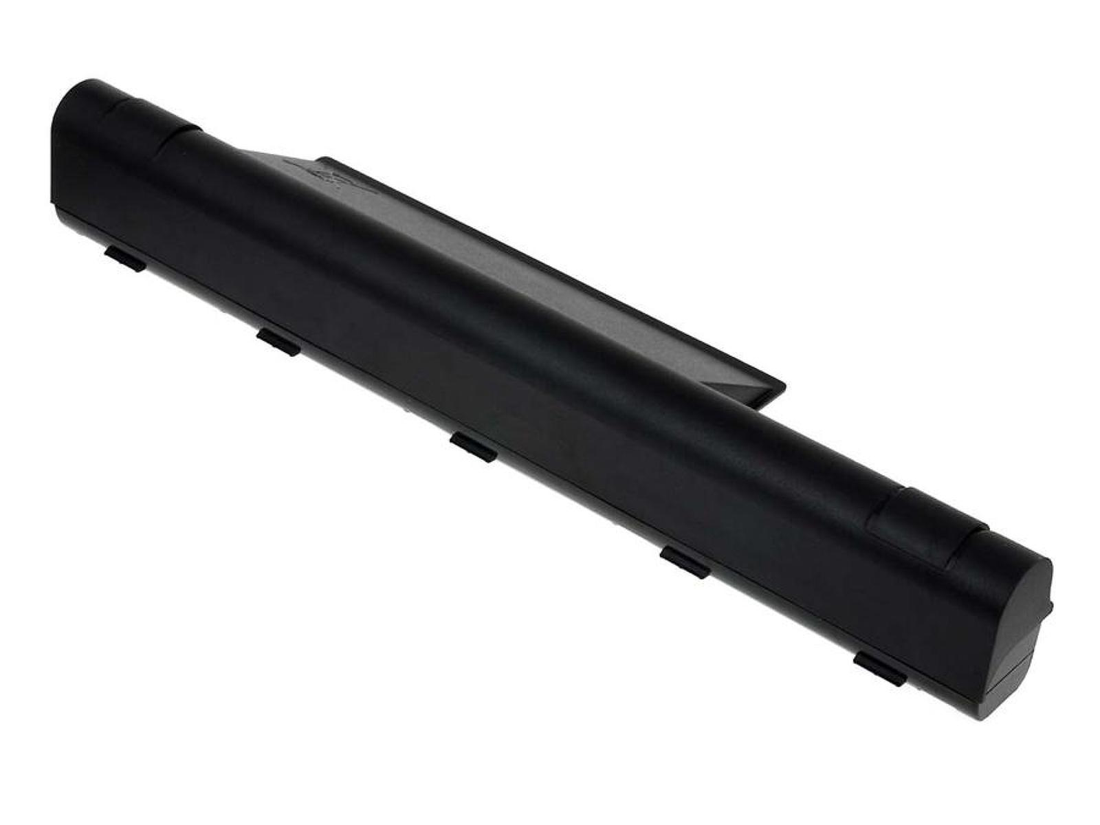 Batería de port átil negra. Tiene forma rectangular alargada con la parte superior estriada.