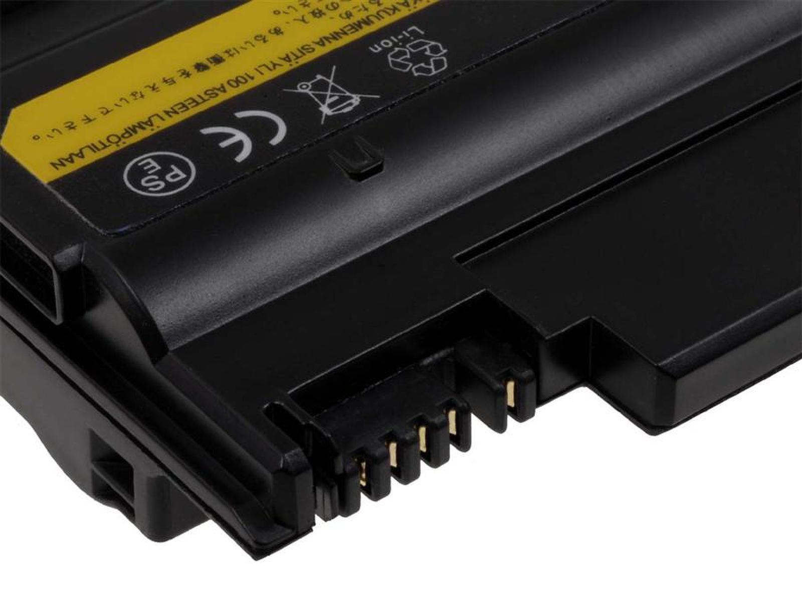 Batería negra para portátil con etiqueta amarilla y pines de conector.