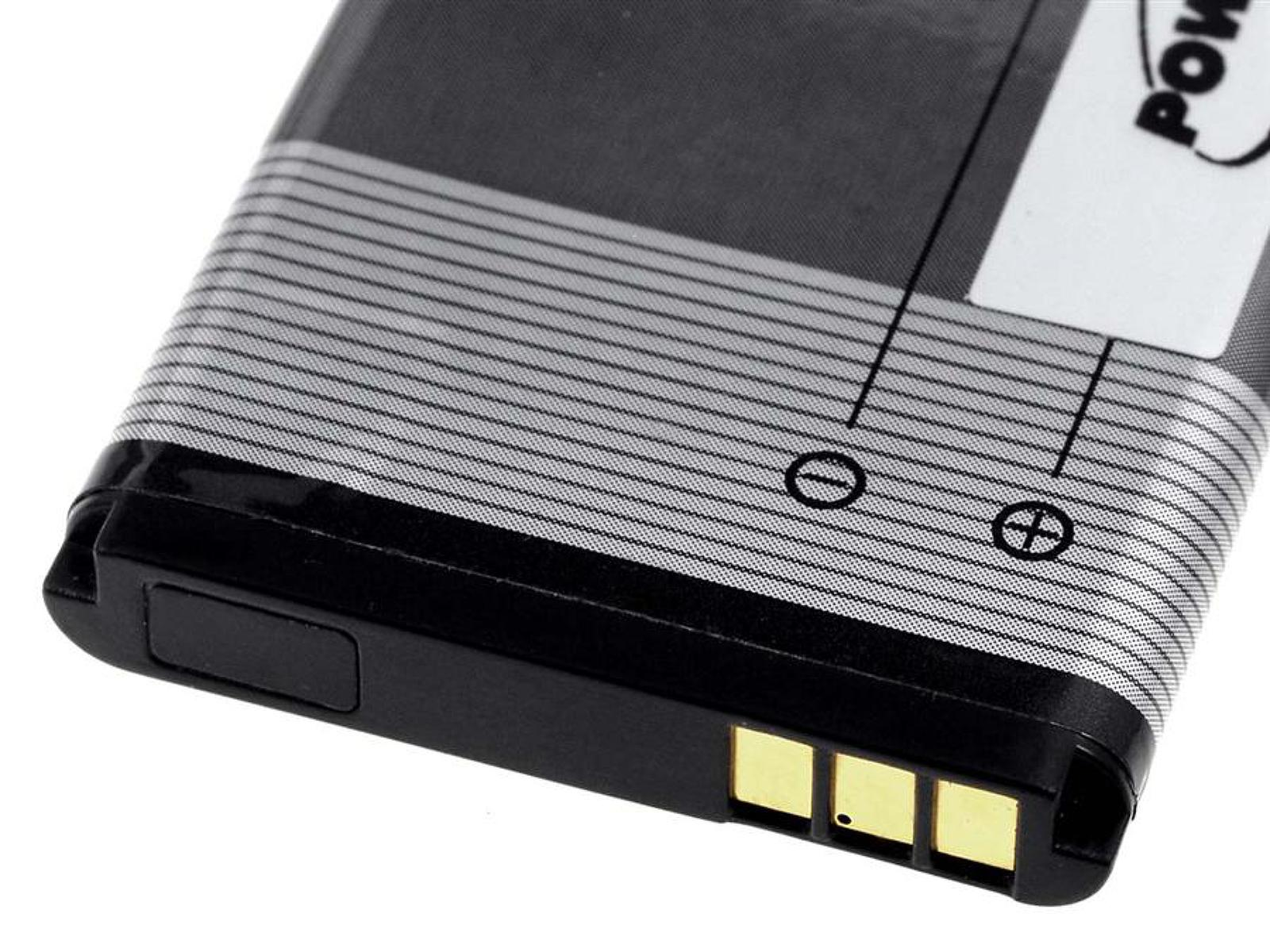 Eine Batterie mit Plus- und Minuspolen. Schwarz und silberfarben. Weißer Hintergrund.