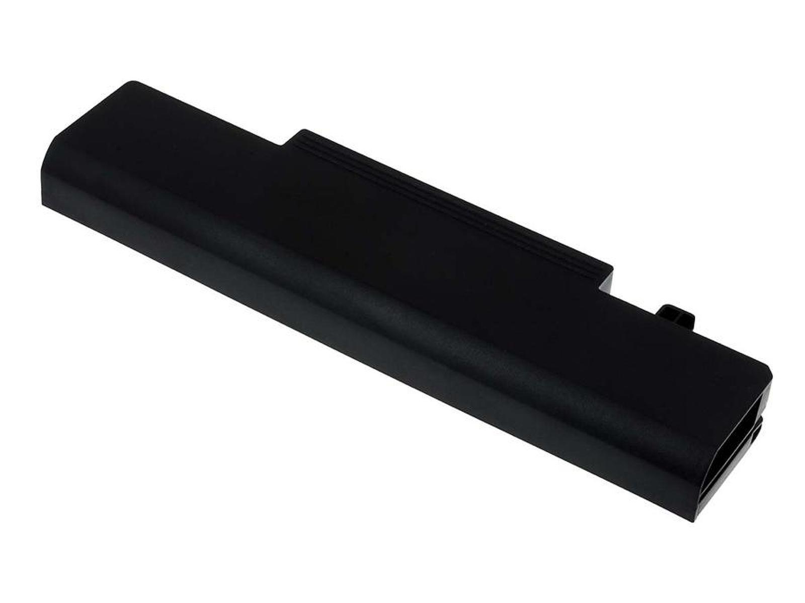 Una batería negra para portátil. La batería es rectangular.
