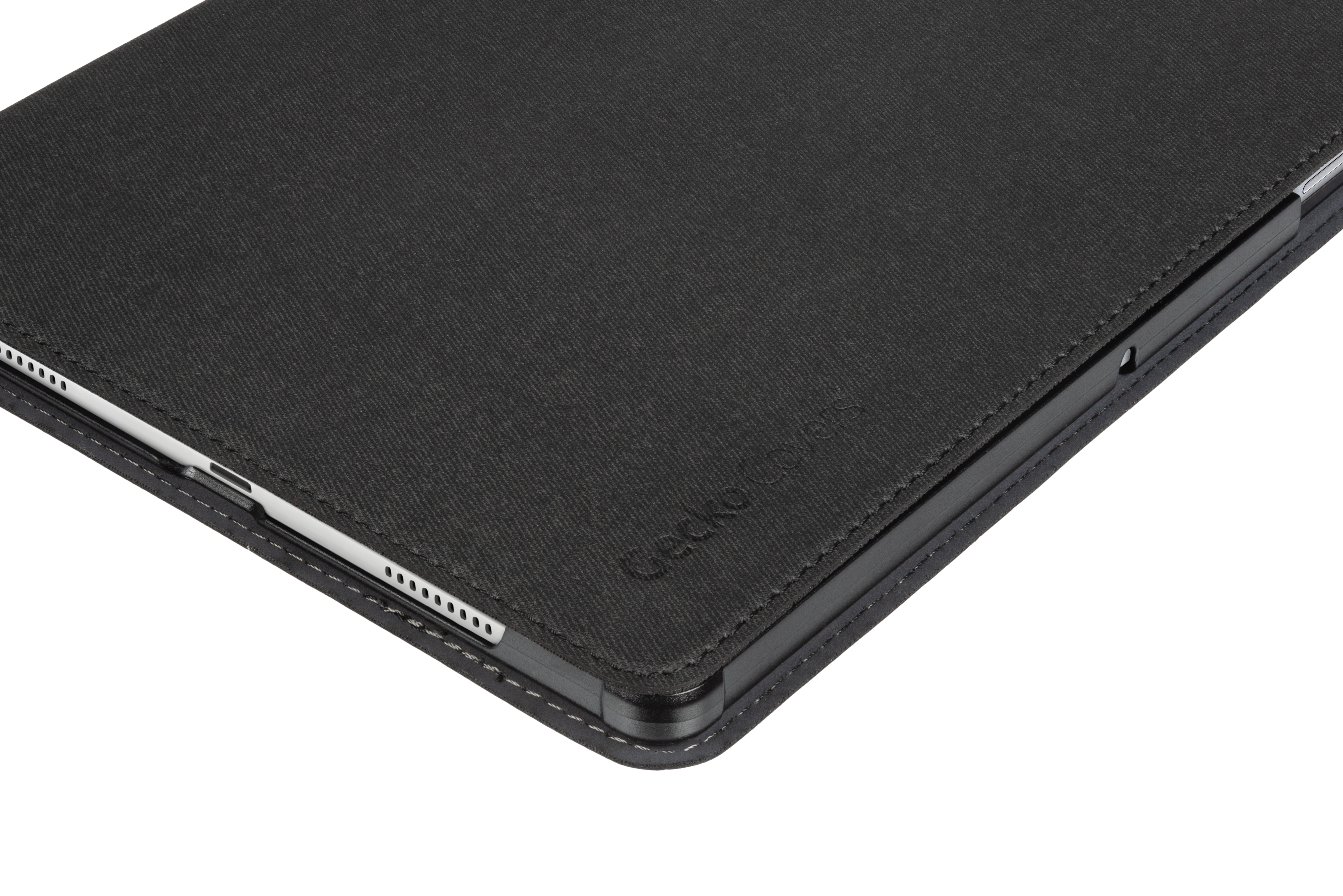 Custodia per tablet nera con superficie strutturata, primo piano.