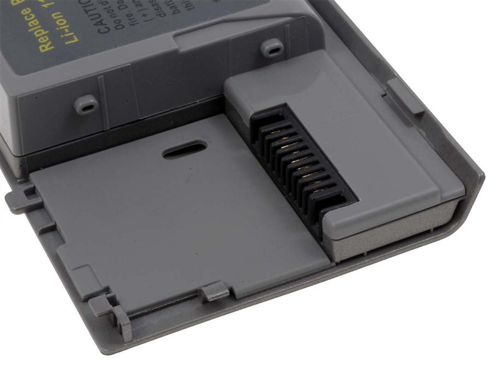Batería gris de portátil con conector abierto y pines expuestos sobre fondo blanco.
