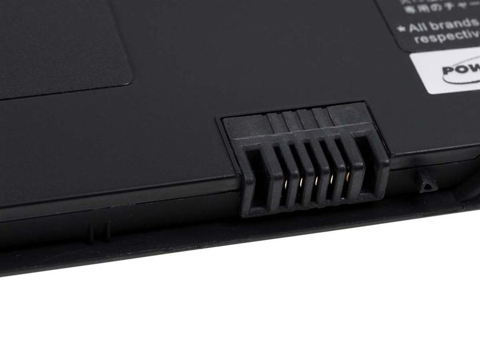 Primer plano del conector de la batería, con múltiples pines dorados y carcasa de plástico negro.