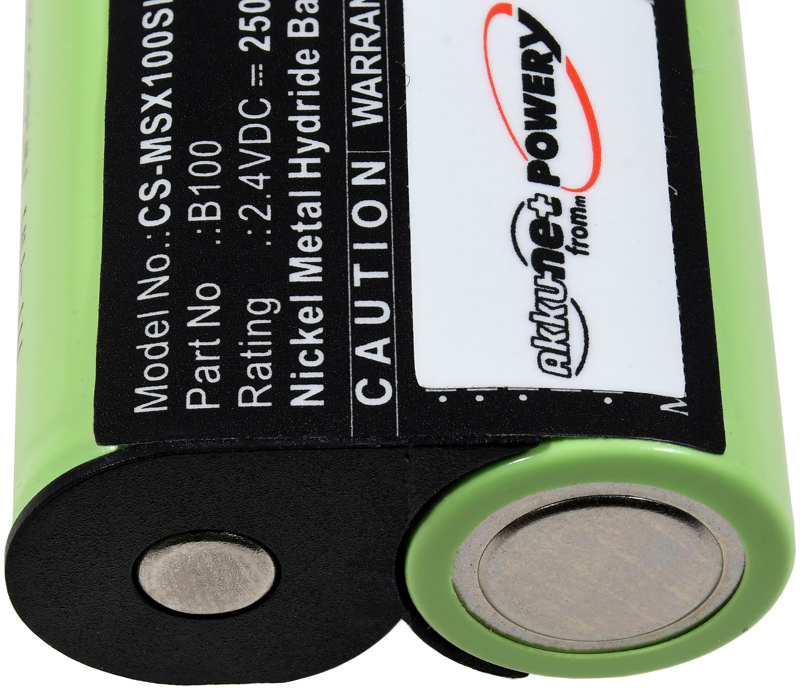 Grüne und schwarze Batterie mit Etikett, Nahaufnahme.