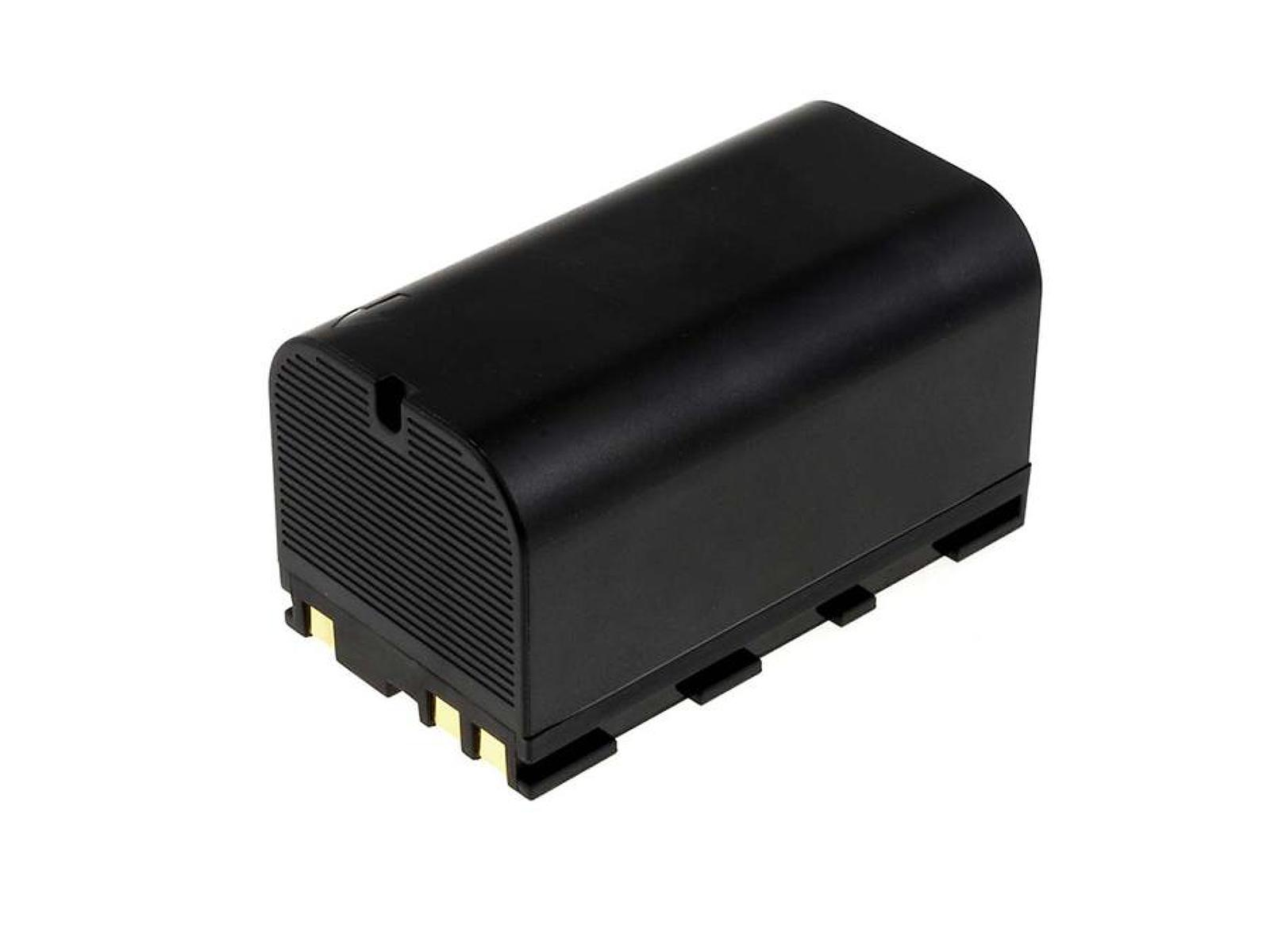 Una batería rectangular negra con conectores dorados sobre un fondo blanco.