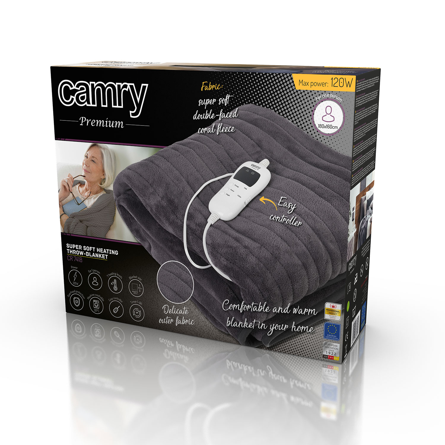 Una coperta riscaldata grigia in una scatola. La scatola mostra la coperta, il controller e le caratteristiche. Testo: 'camry'.