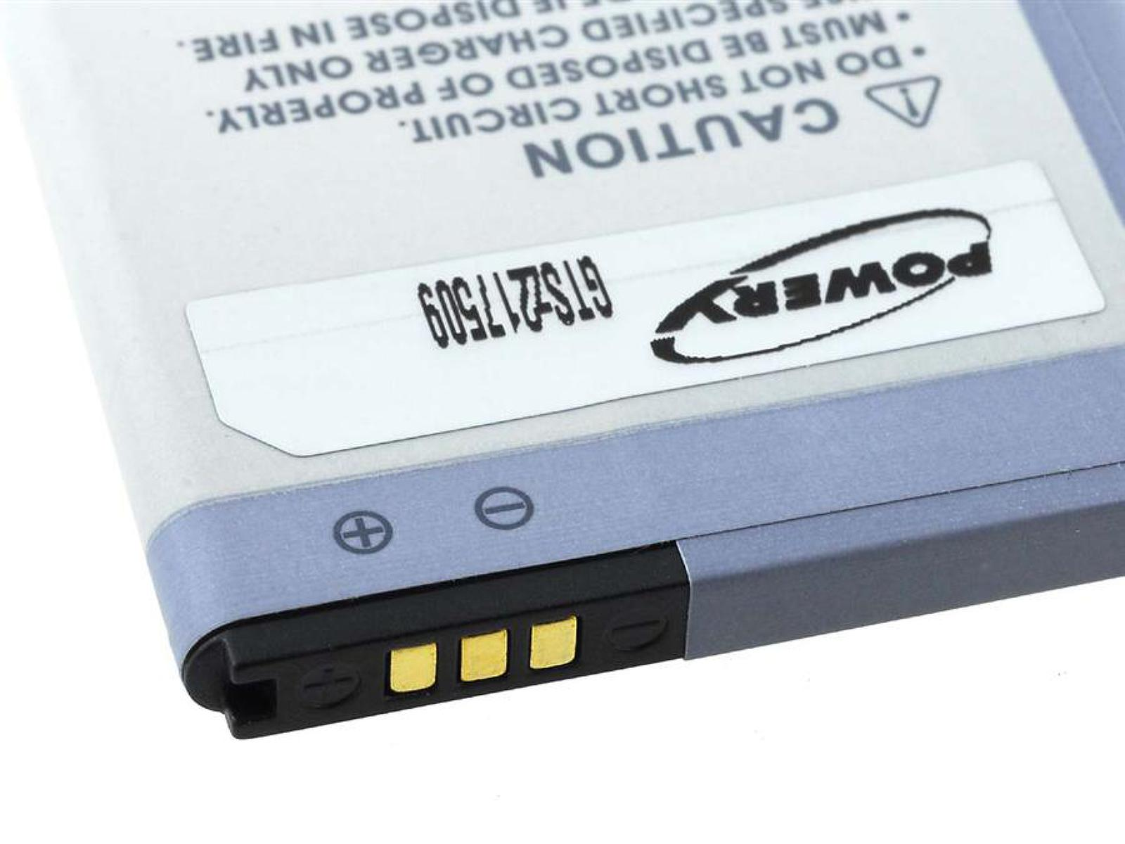 Primer plano de una batería de teléfono con instrucciones de precaución. Gris y negro.