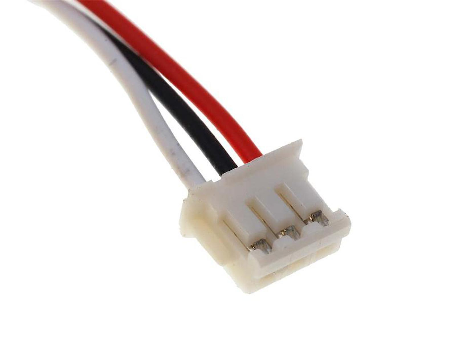 Un conector blanco con tres cables conectados: rojo, blanco y negro.