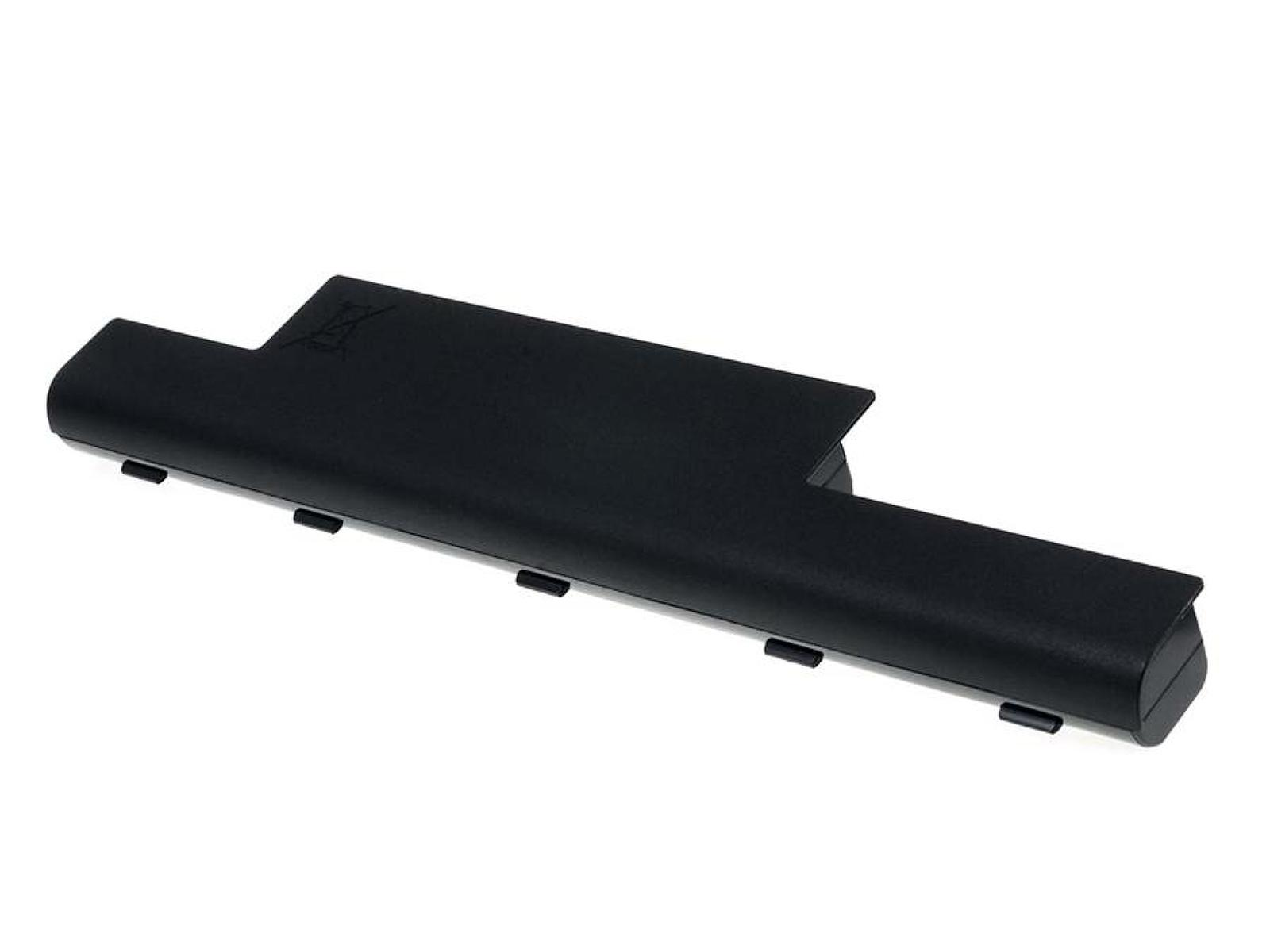 Batería negra para portátil sobre fondo blanco. Es rectangular con un recorte.