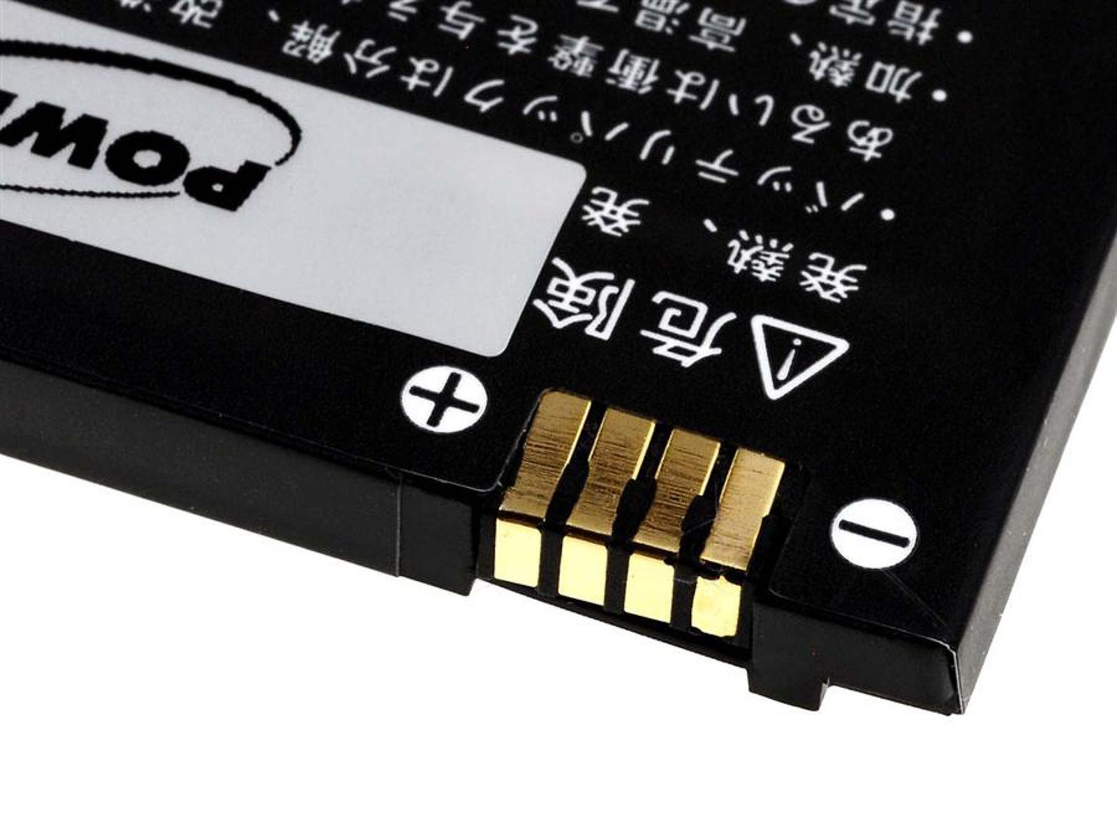 Primer plano de un paquete de baterías negro con conectores dorados.