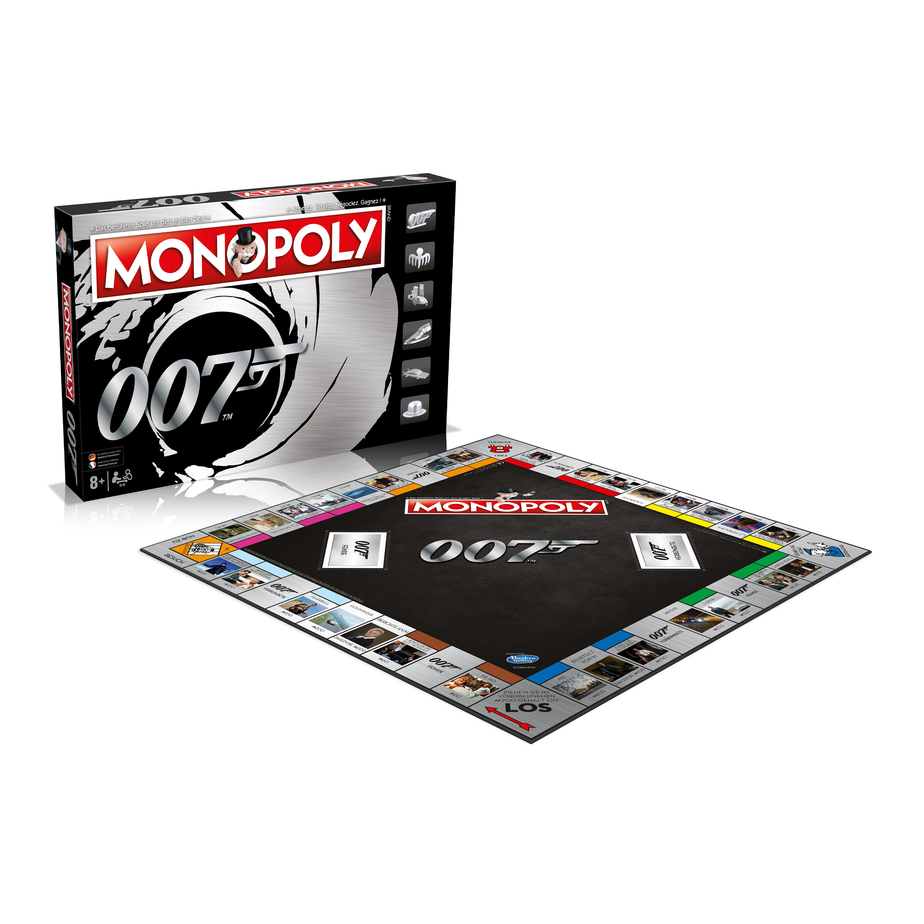 Monopoly 007 Brettspiel, geöffnet, mit der Schachtel im Hintergrund.