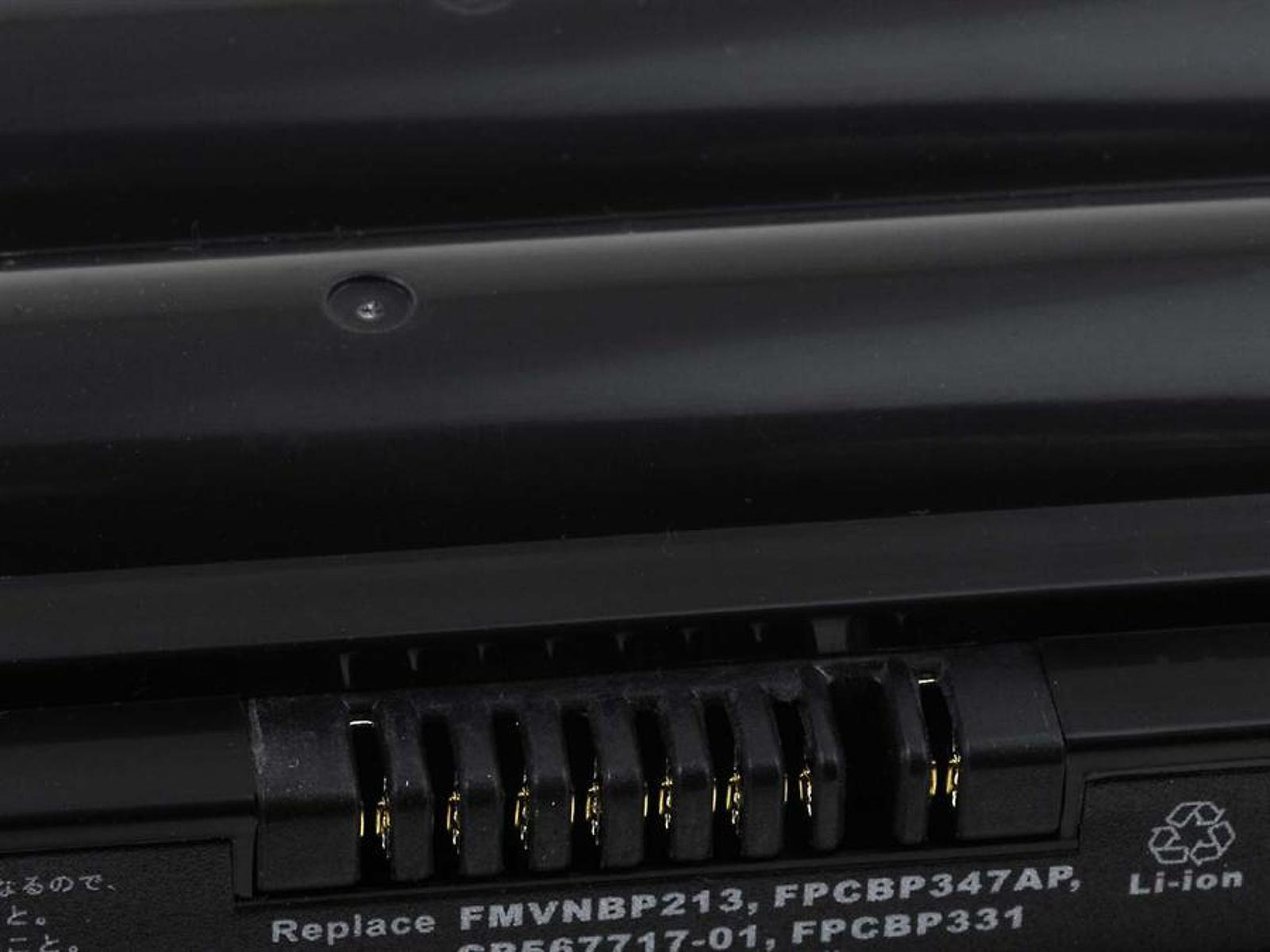 Batería negra con un conector. La batería tiene una etiqueta con texto y símbolos.